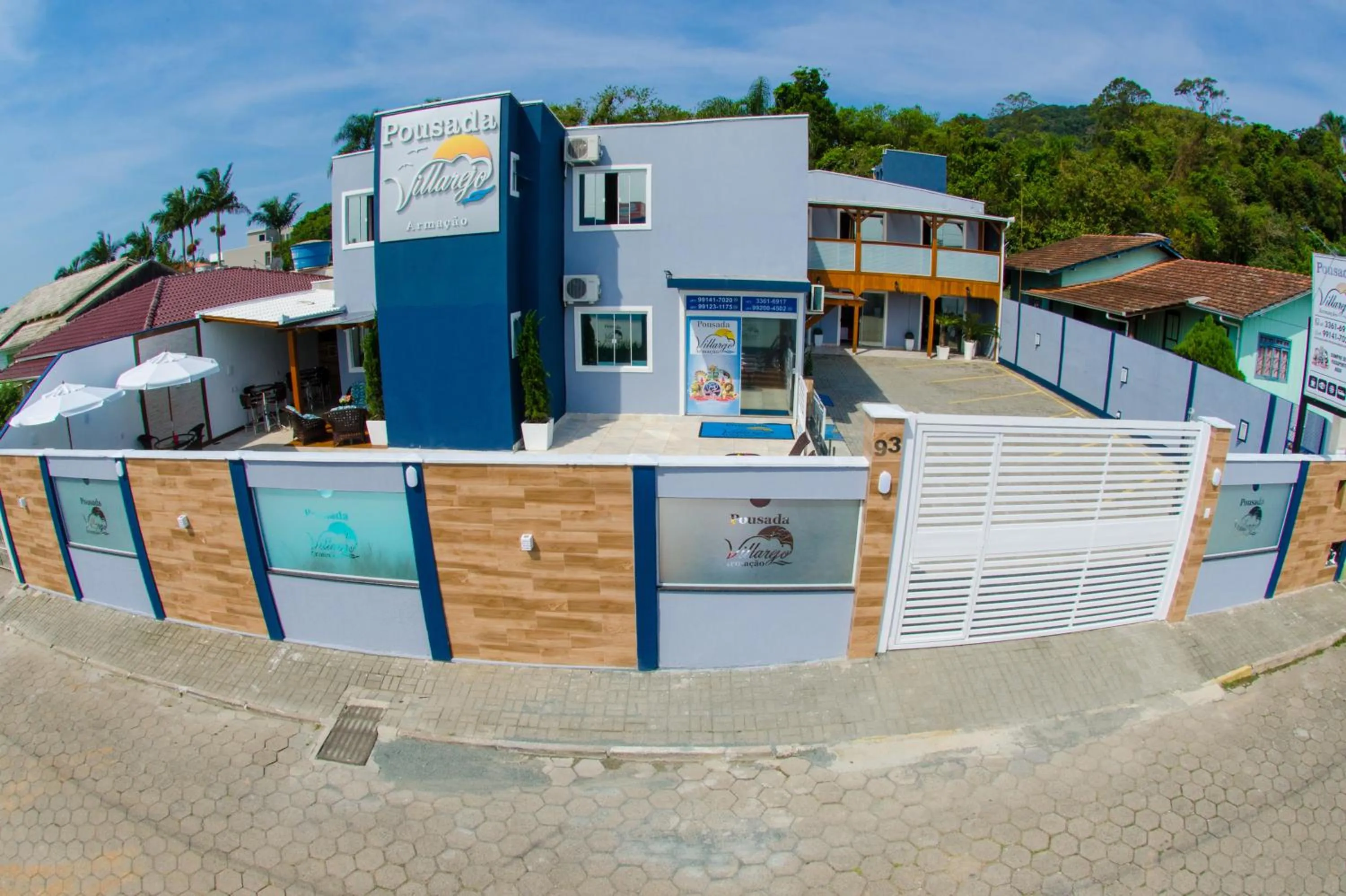Swimming pool in Pousada Villarejo Armação
