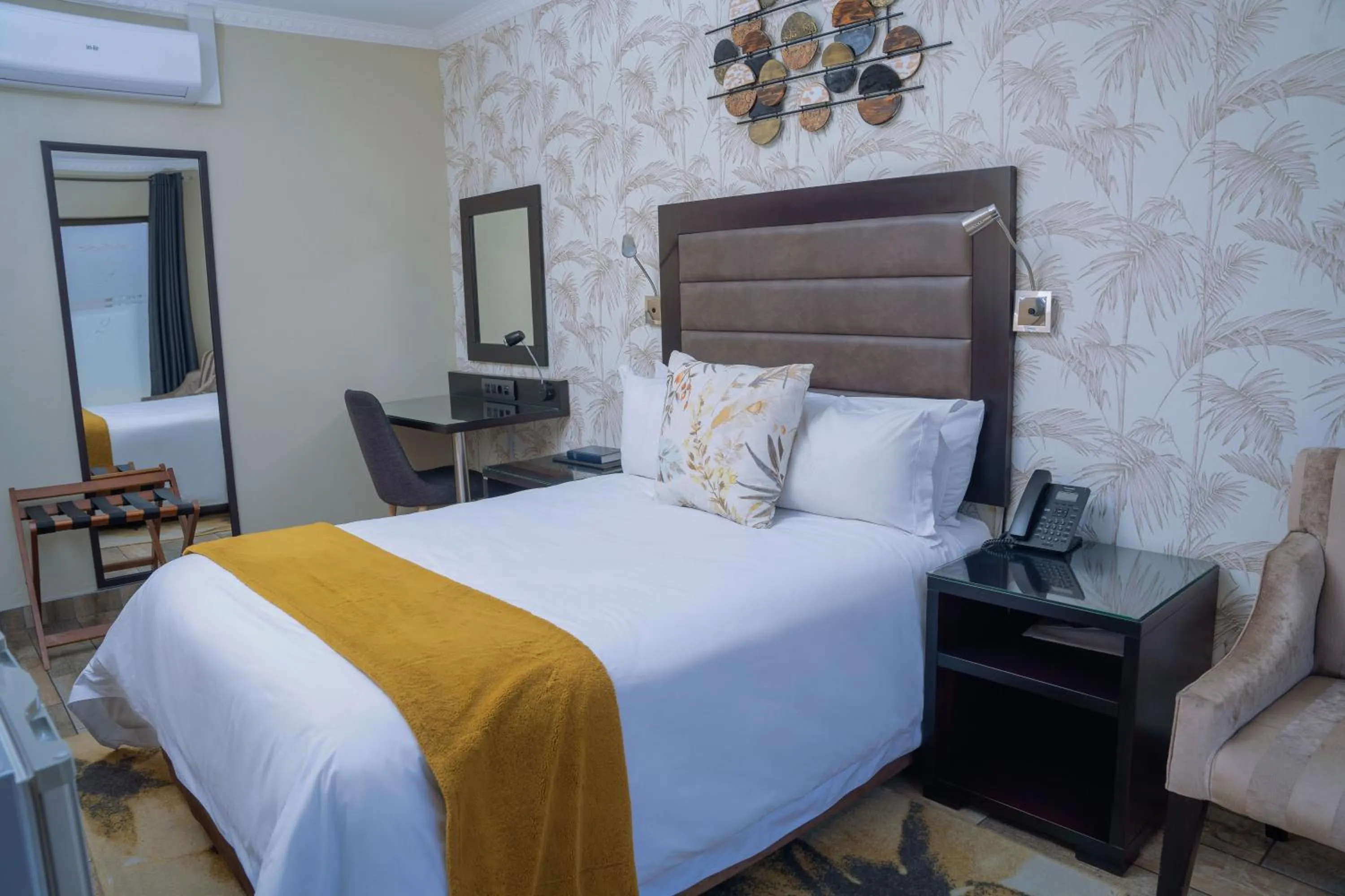 Bed in Q's Boutique Stay