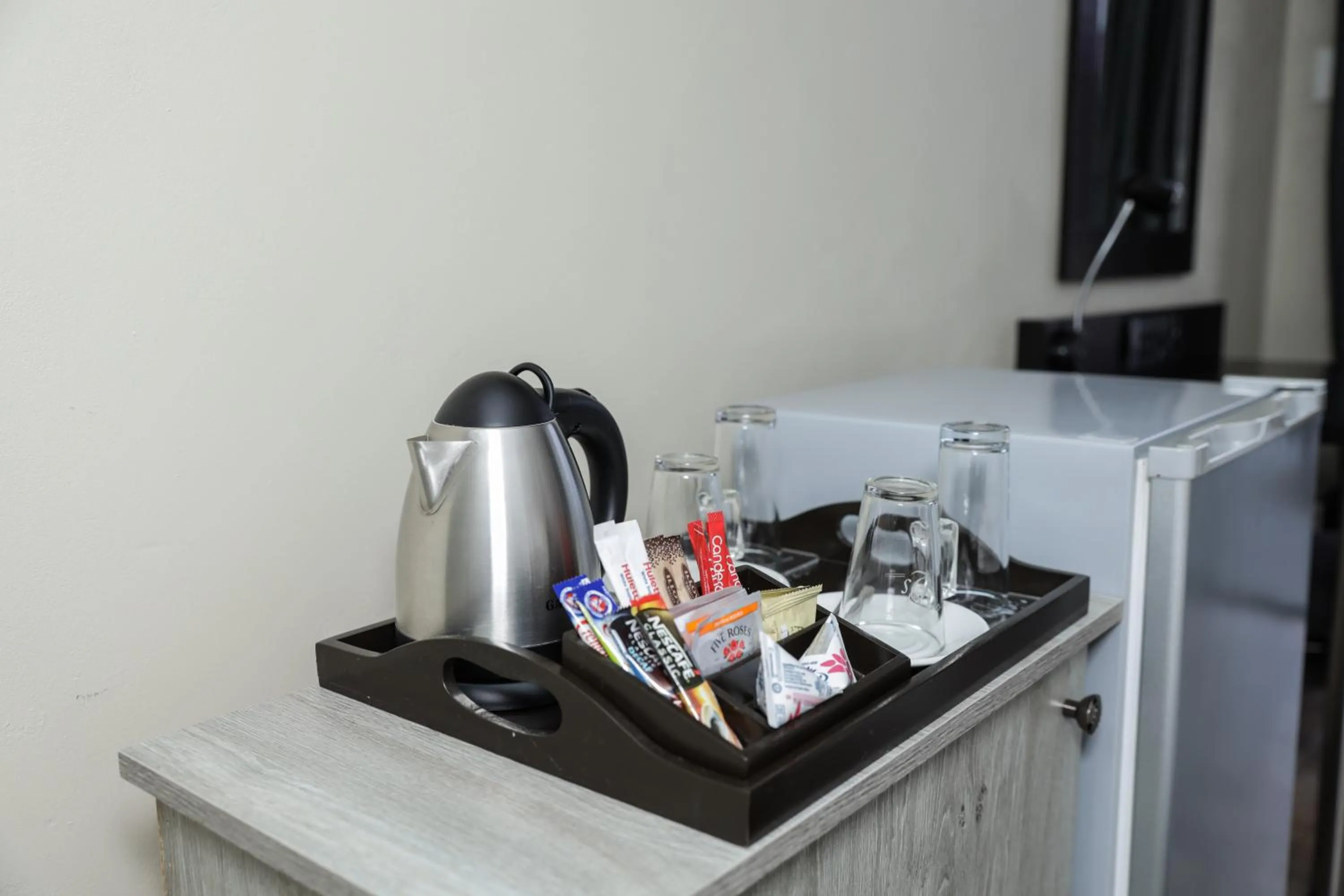 Coffee/tea facilities in Q's Boutique Stay