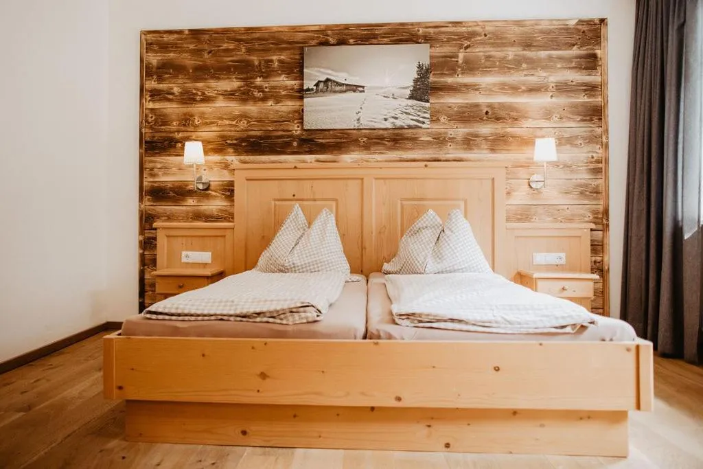 Bed in Ferienwohnungen Wartbichler