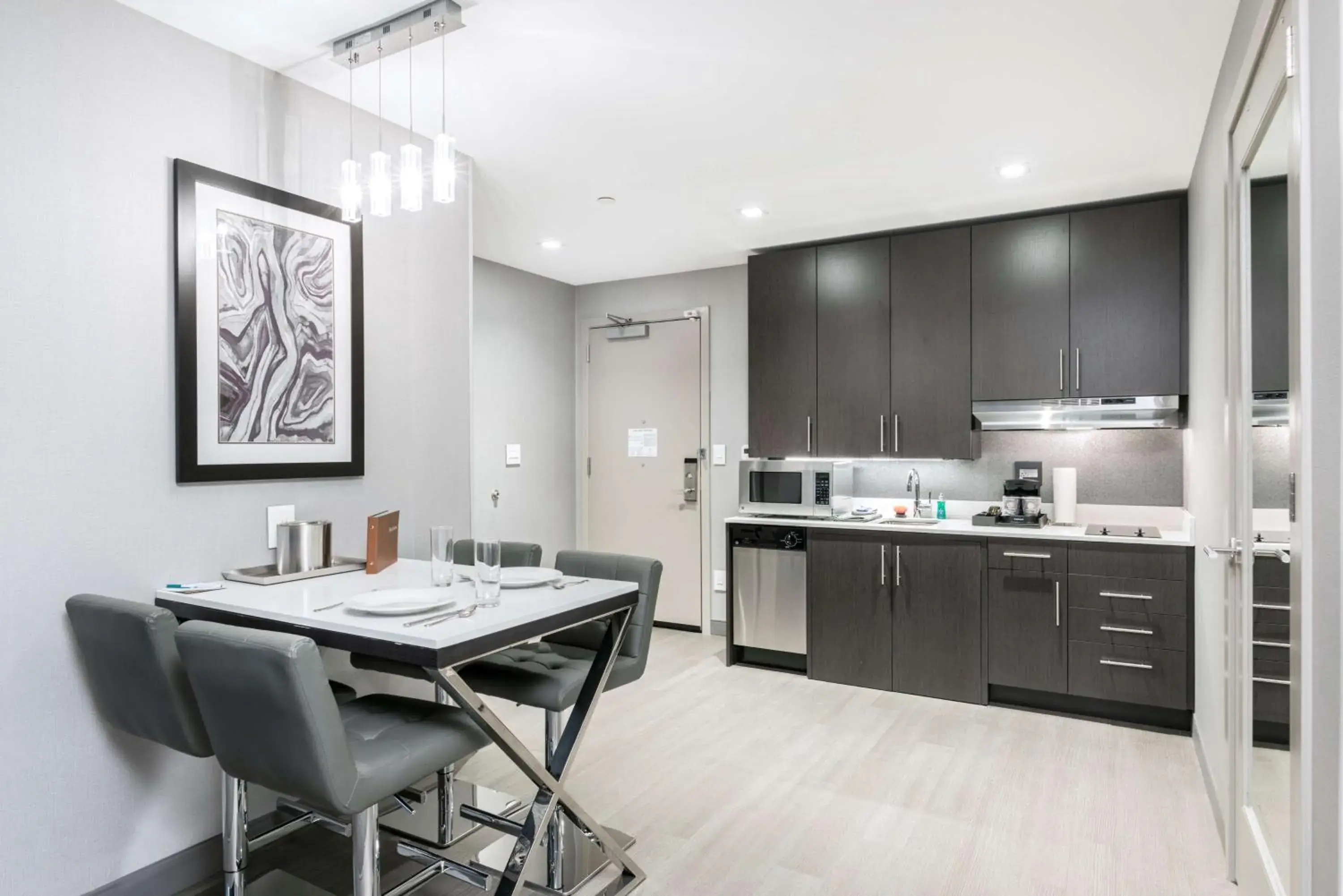 Bedroom, Kitchen/Kitchenette in Homewood Suites By Hilton Boston Logan Airport Chelsea