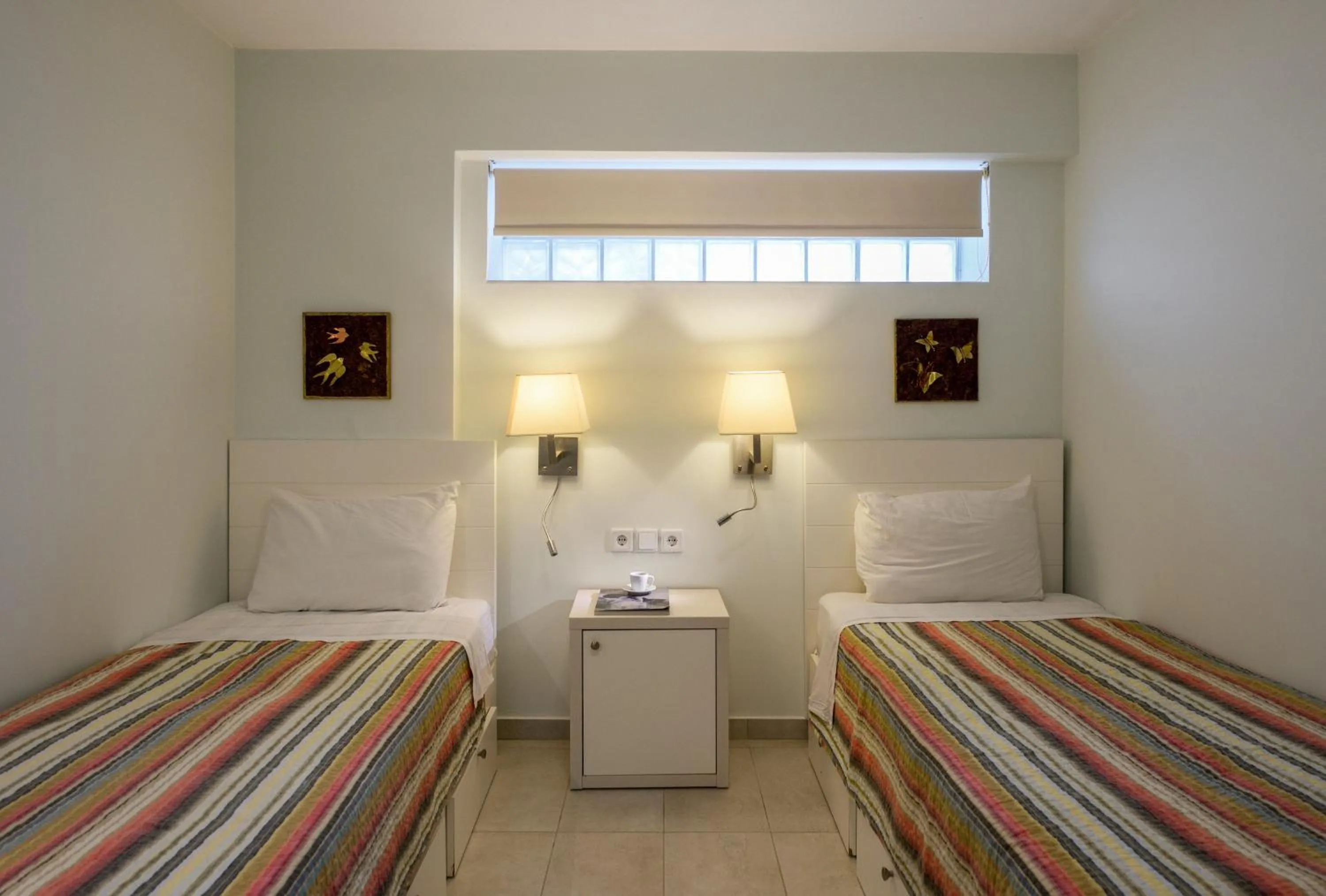 Bed in Elpiniki Luxury Apartments