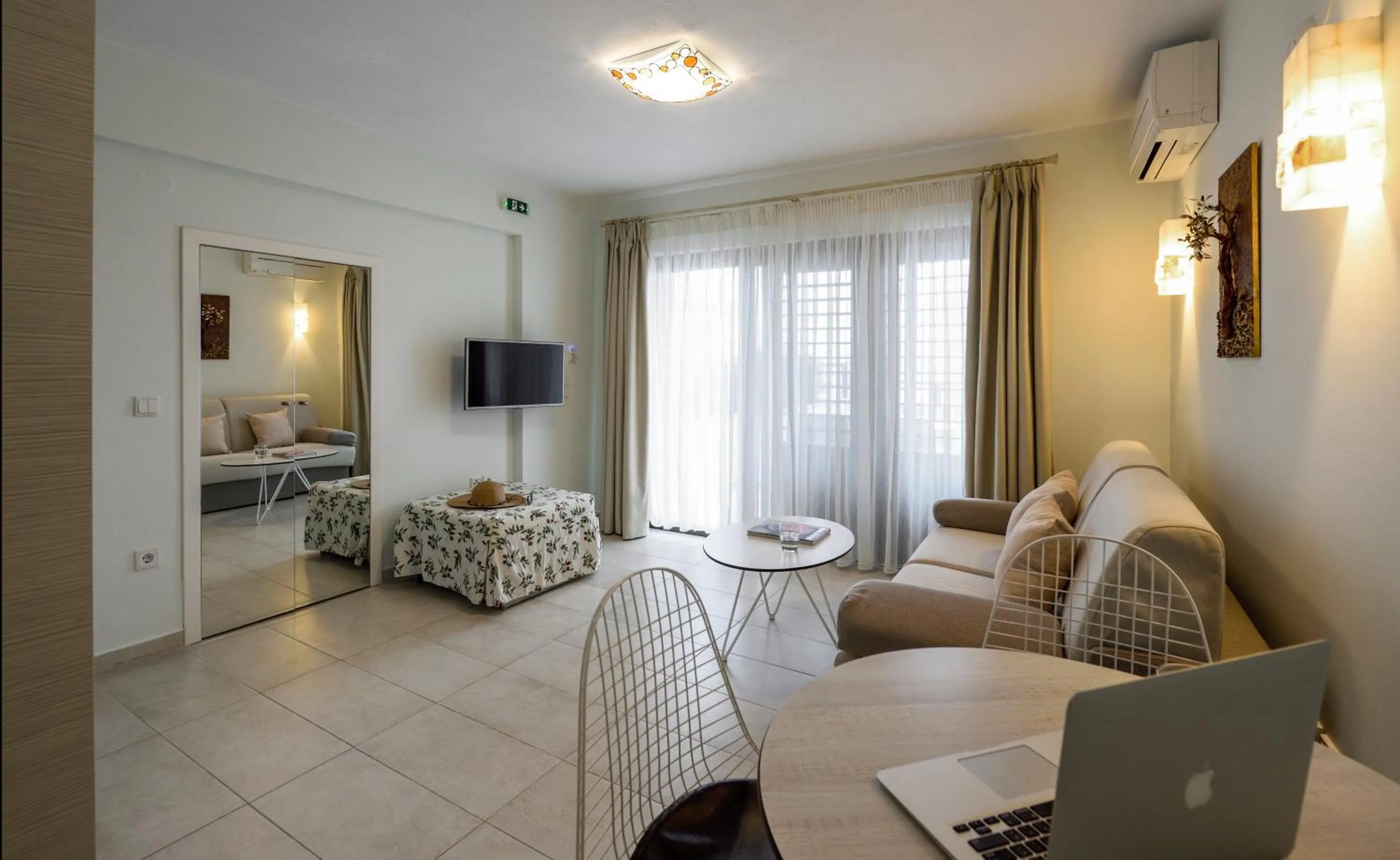 Bed in Elpiniki Luxury Apartments