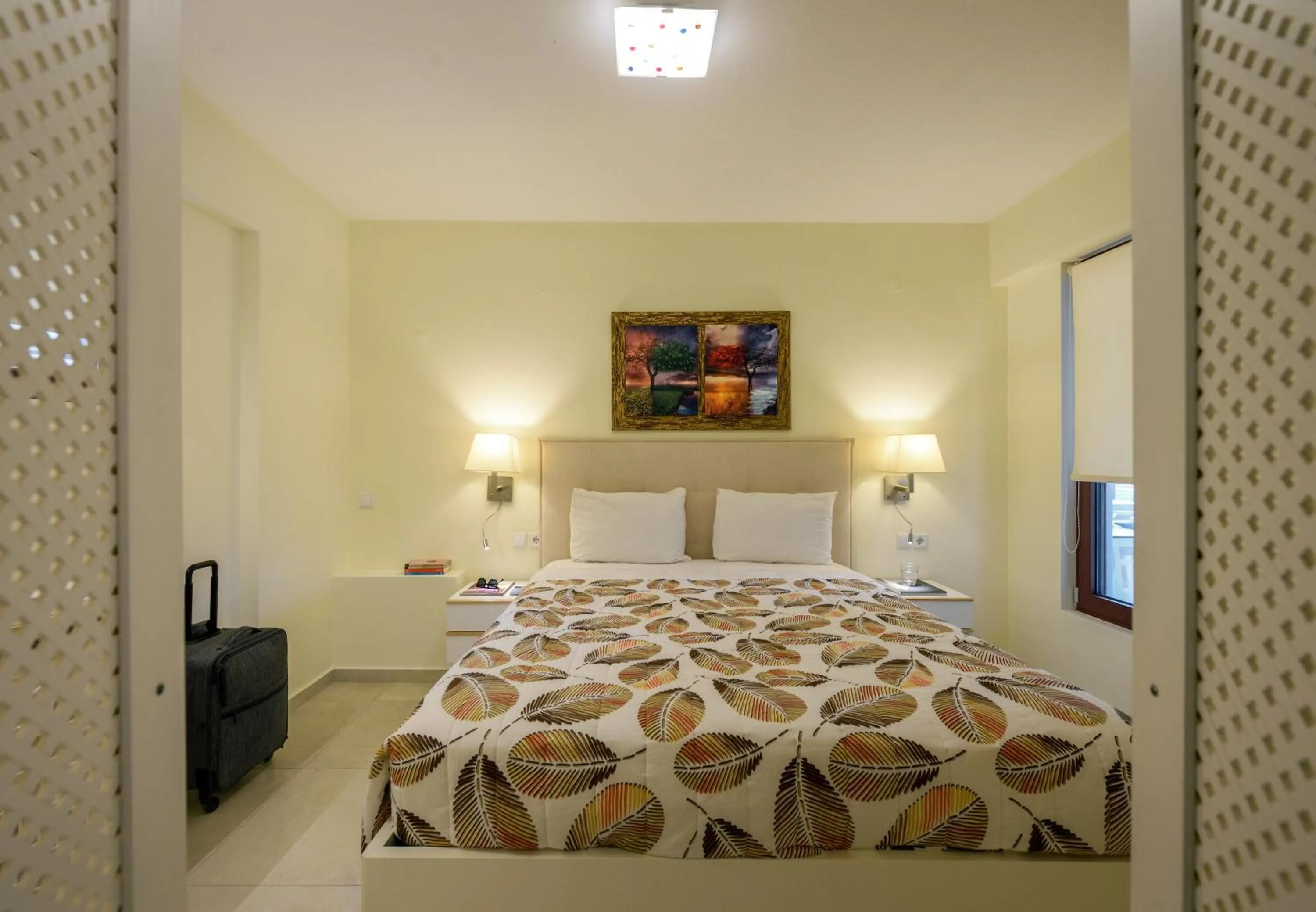 Bed in Elpiniki Luxury Apartments