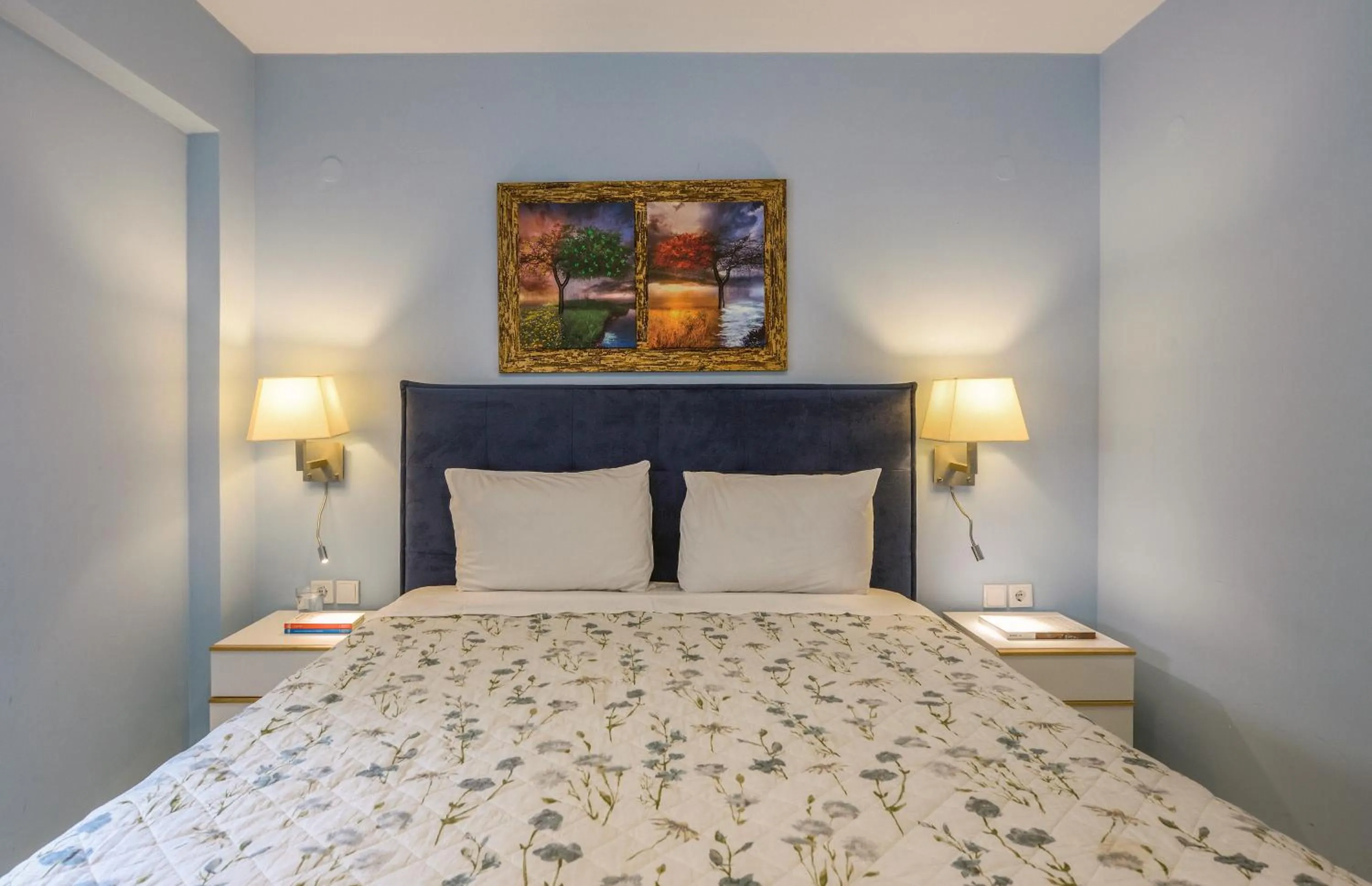 Bed in Elpiniki Luxury Apartments