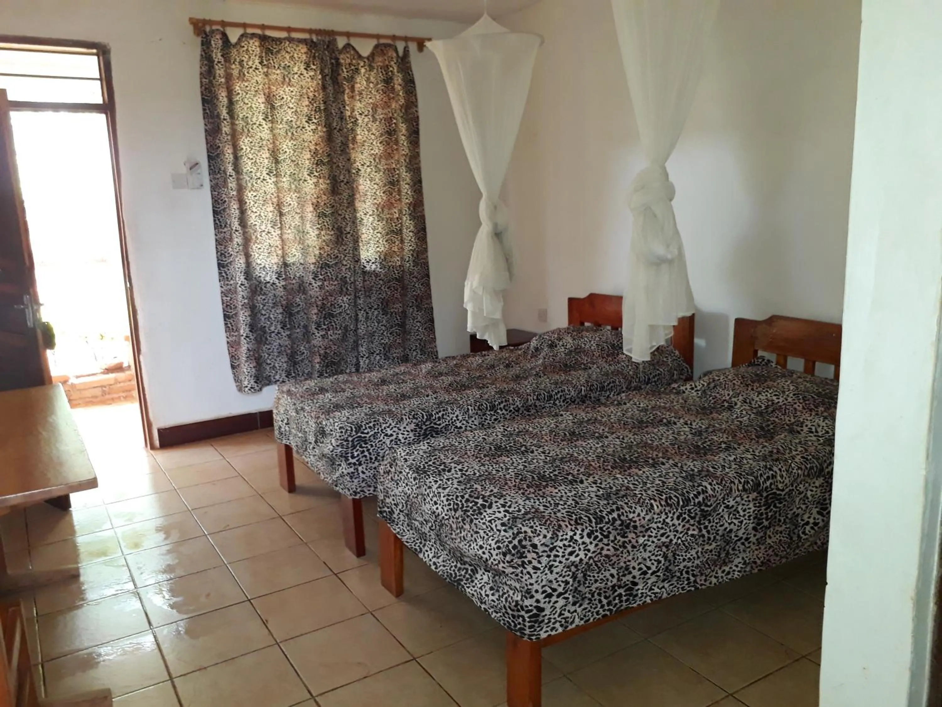 Bed in Mama Pierina Restaurant and Annex