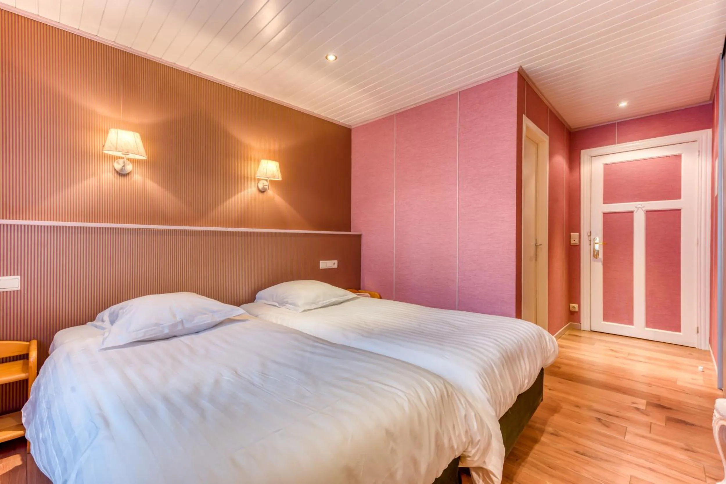 Bed in Hôtel Le Cor de Chasse