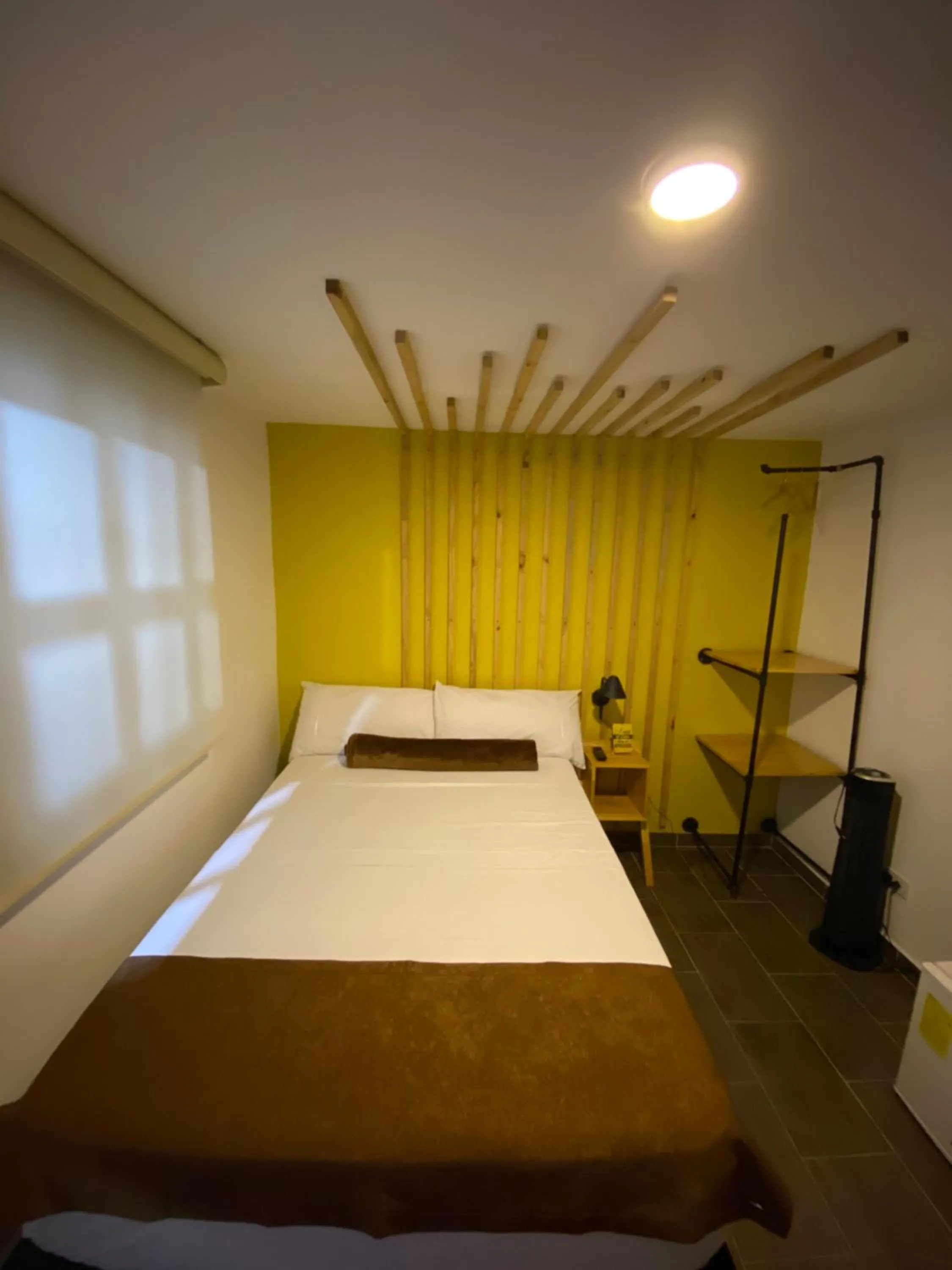 Bed in Rivière Boutique Hotel