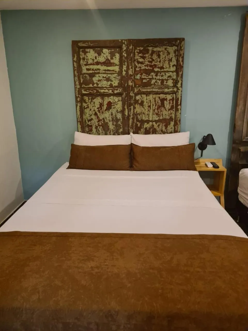 Bed in Rivière Boutique Hotel