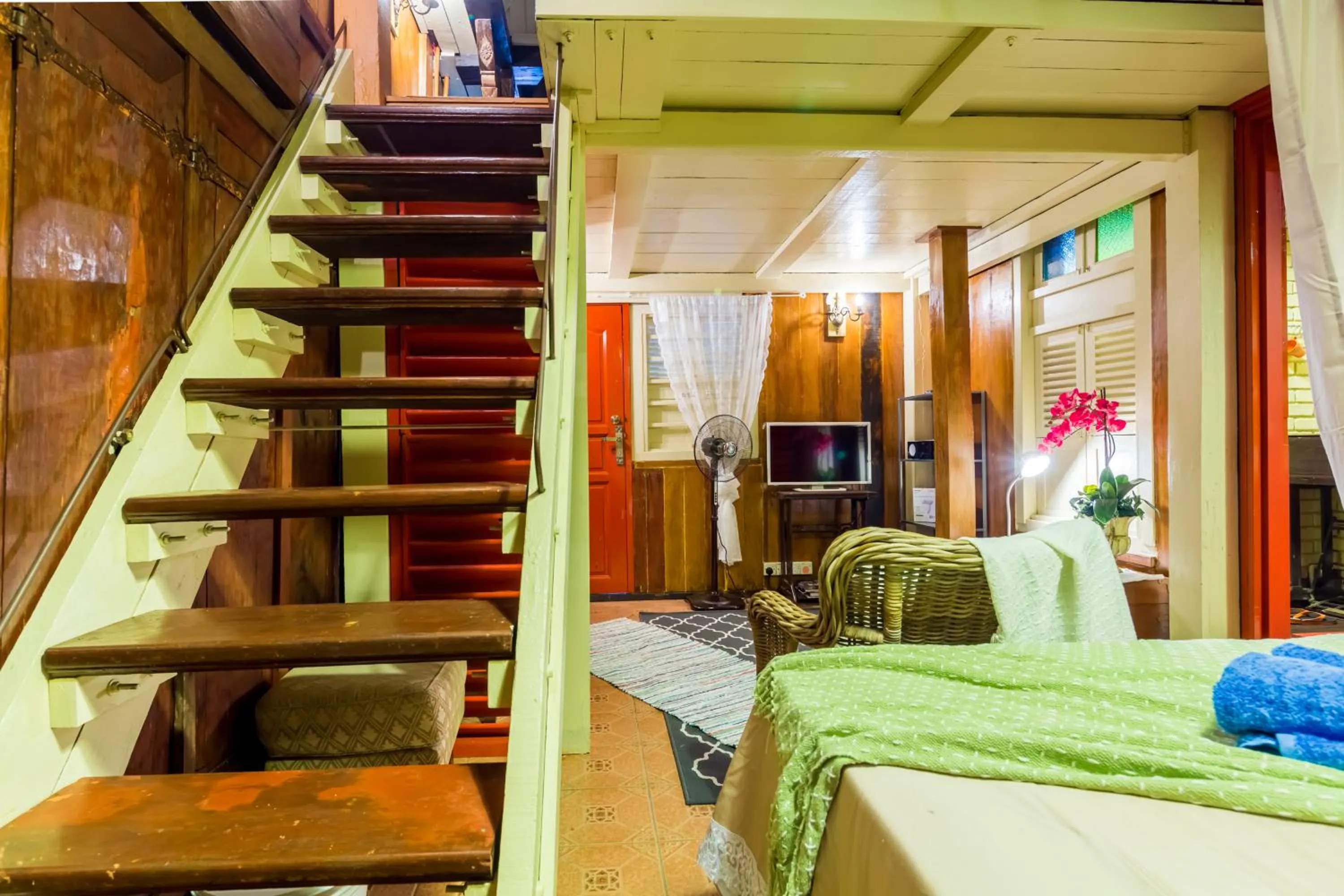 Photo of the whole room, Bed in Classic Malay House in KL City Centre