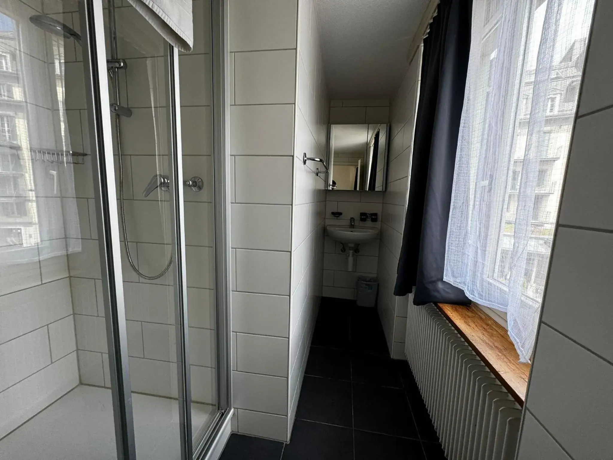Standard Twin Room with Shared Bathroom in Swiss Holidays-City Apartments Interlaken Standard Twin Room with Shared Bathroom in Swiss Holidays-City Apartments Interlaken