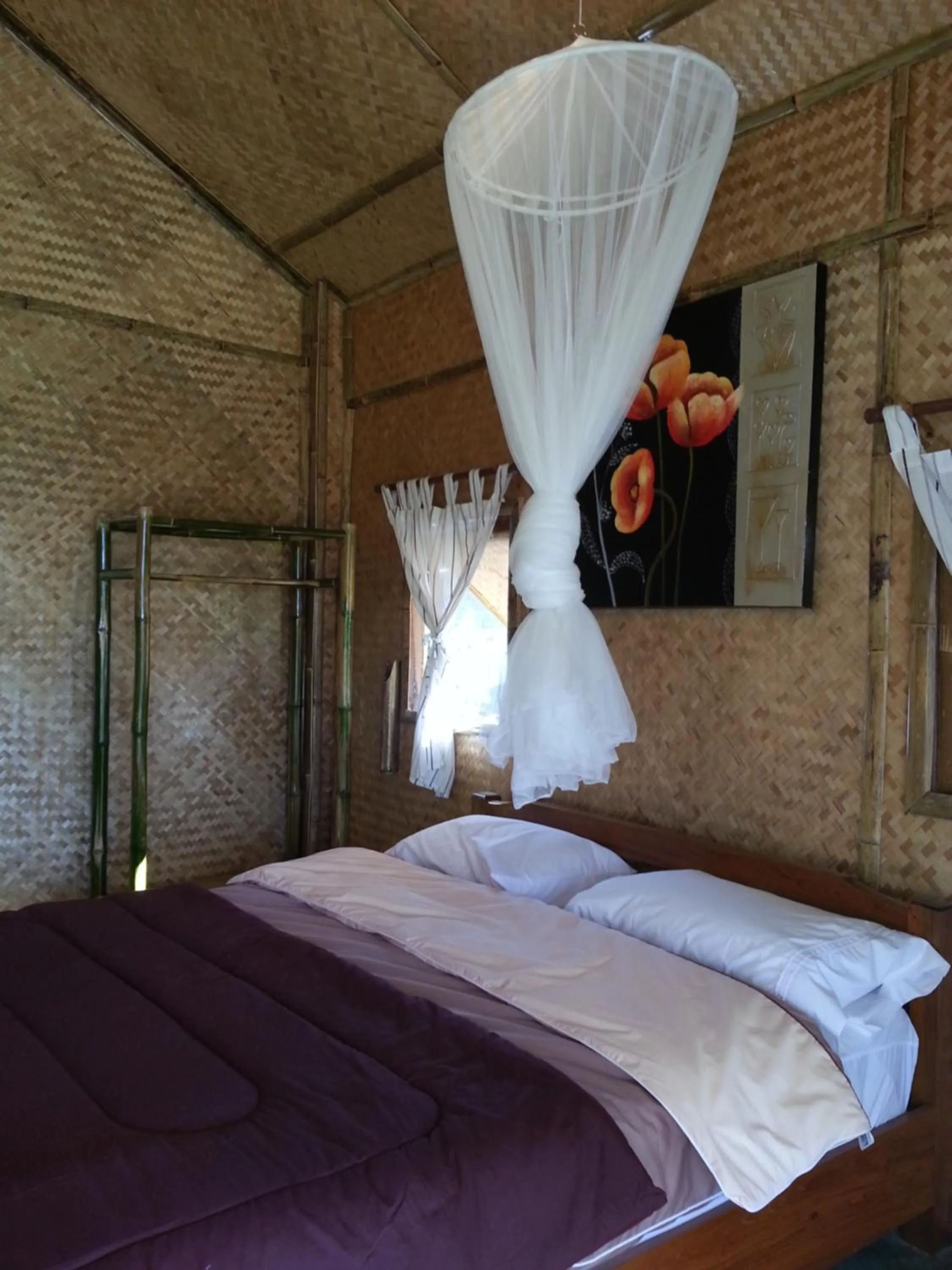 Bed in Tulip Resort Pai