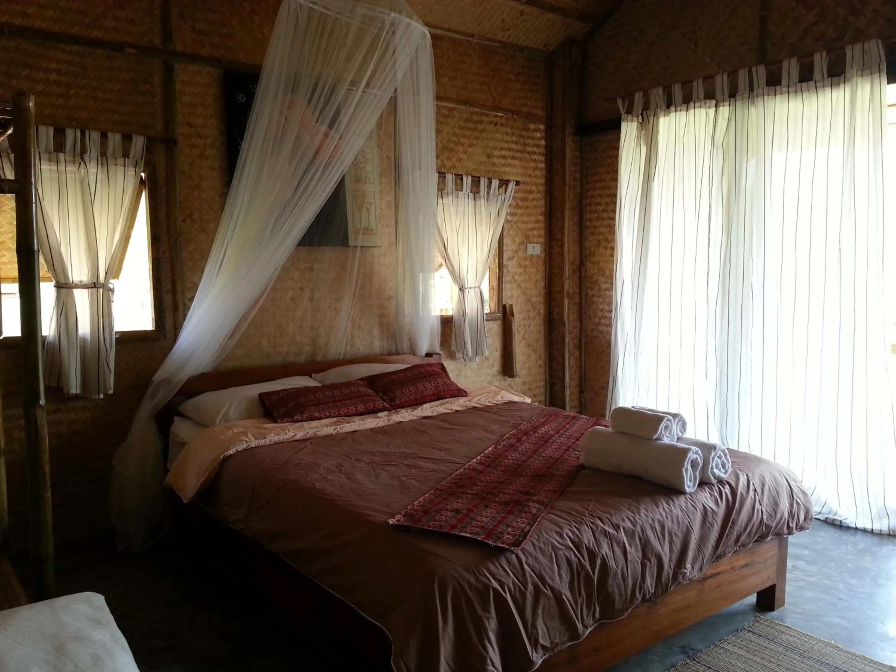 Bed in Tulip Resort Pai