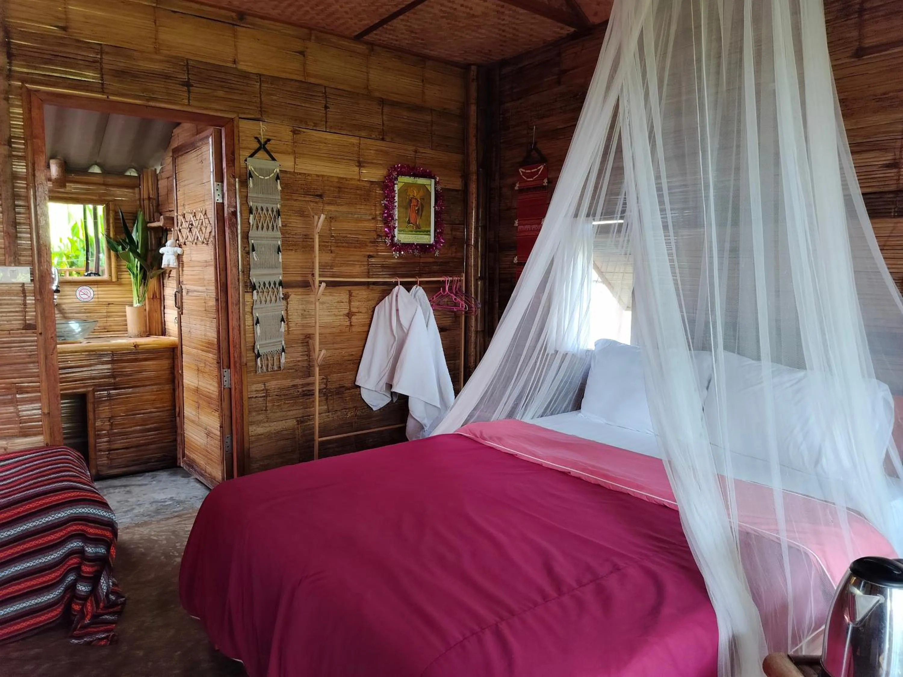 Bed in Tulip Resort Pai
