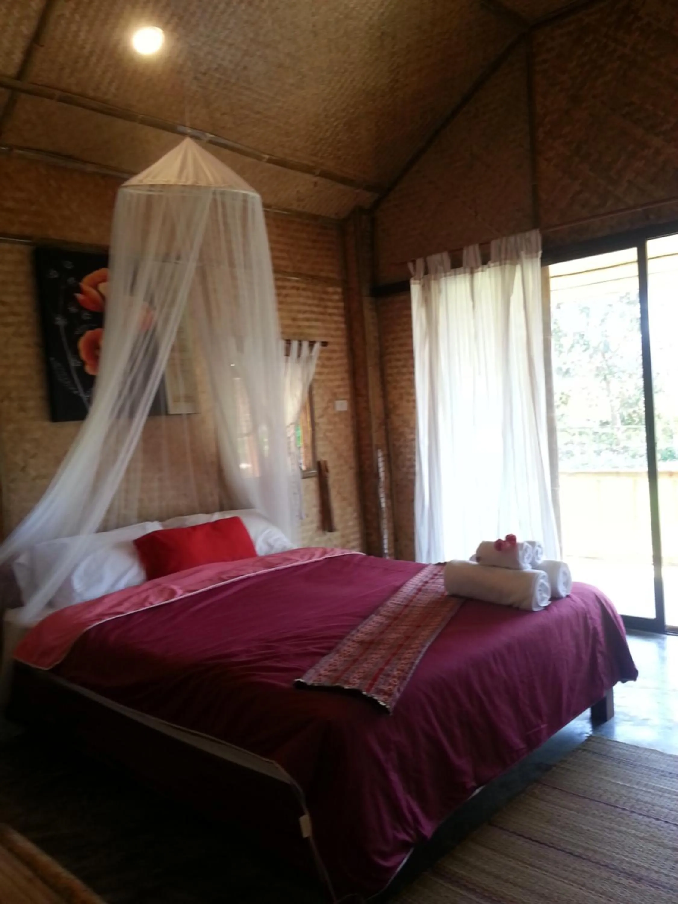 Bed in Tulip Resort Pai