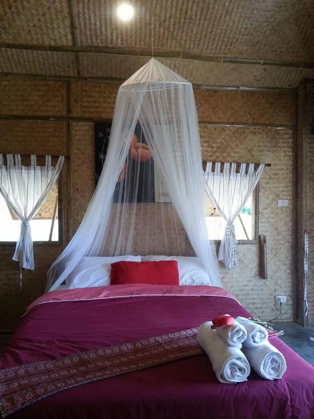 Bed in Tulip Resort Pai