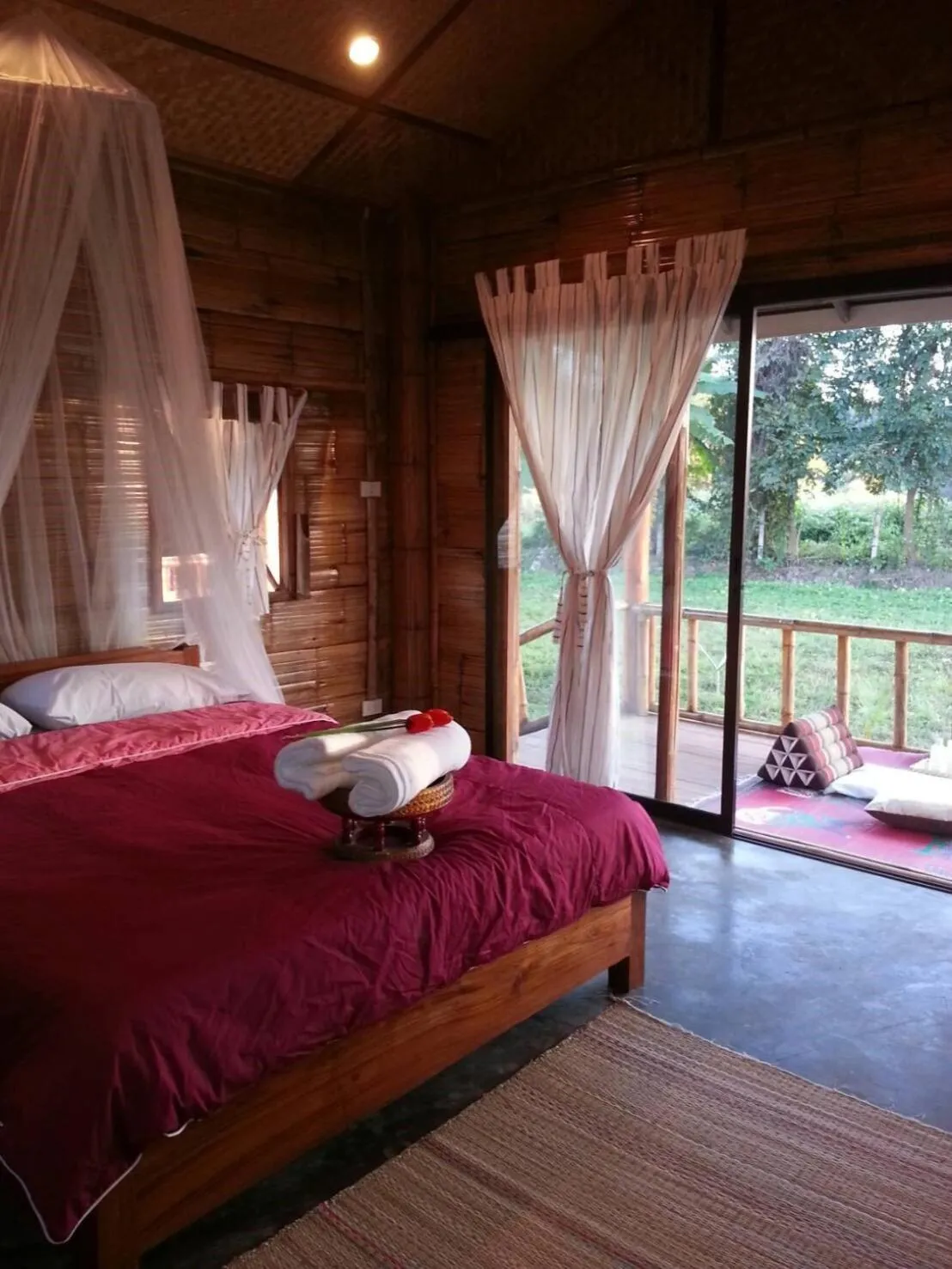 Bed in Tulip Resort Pai