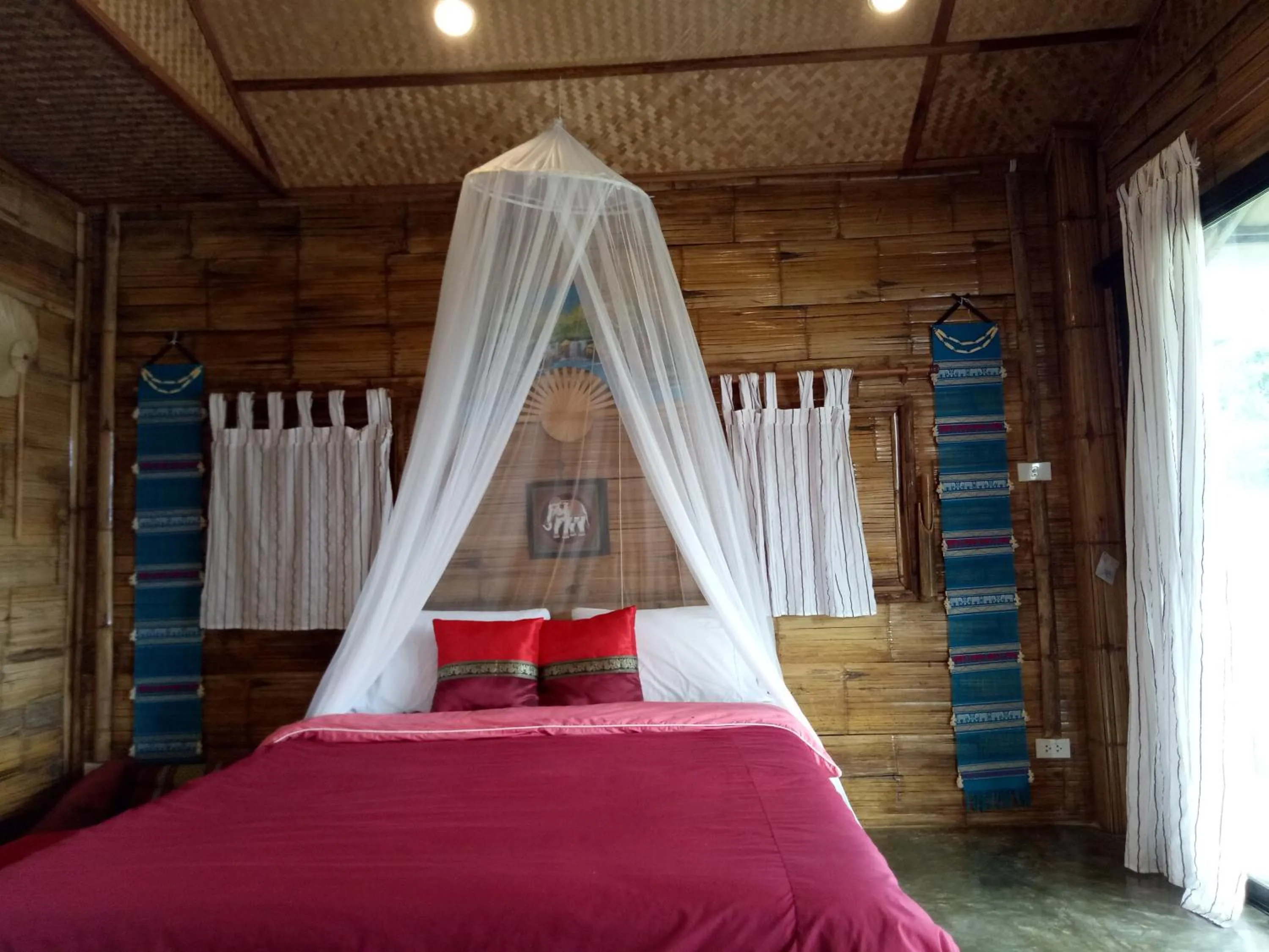 Bed in Tulip Resort Pai