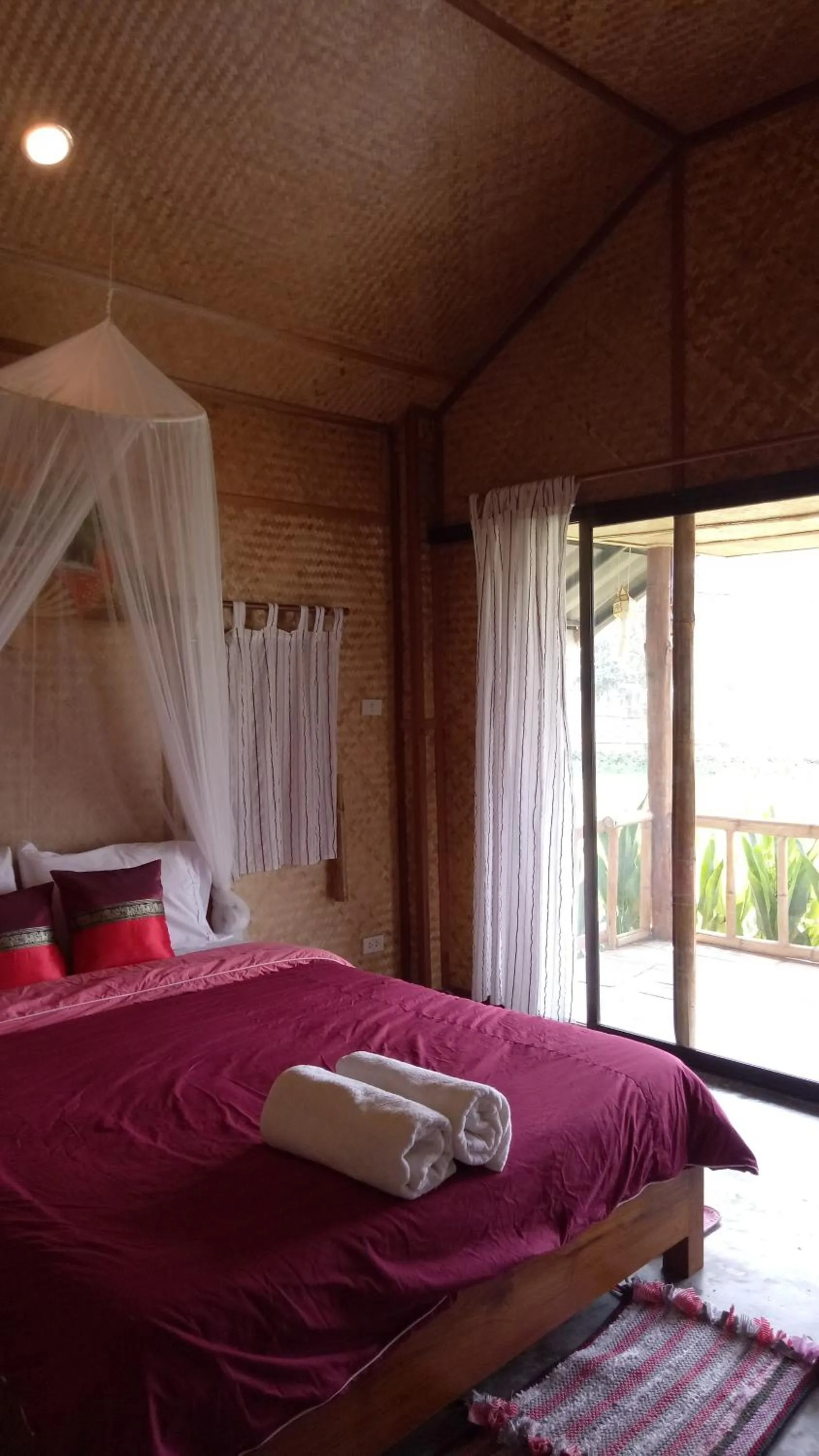 Bed in Tulip Resort Pai