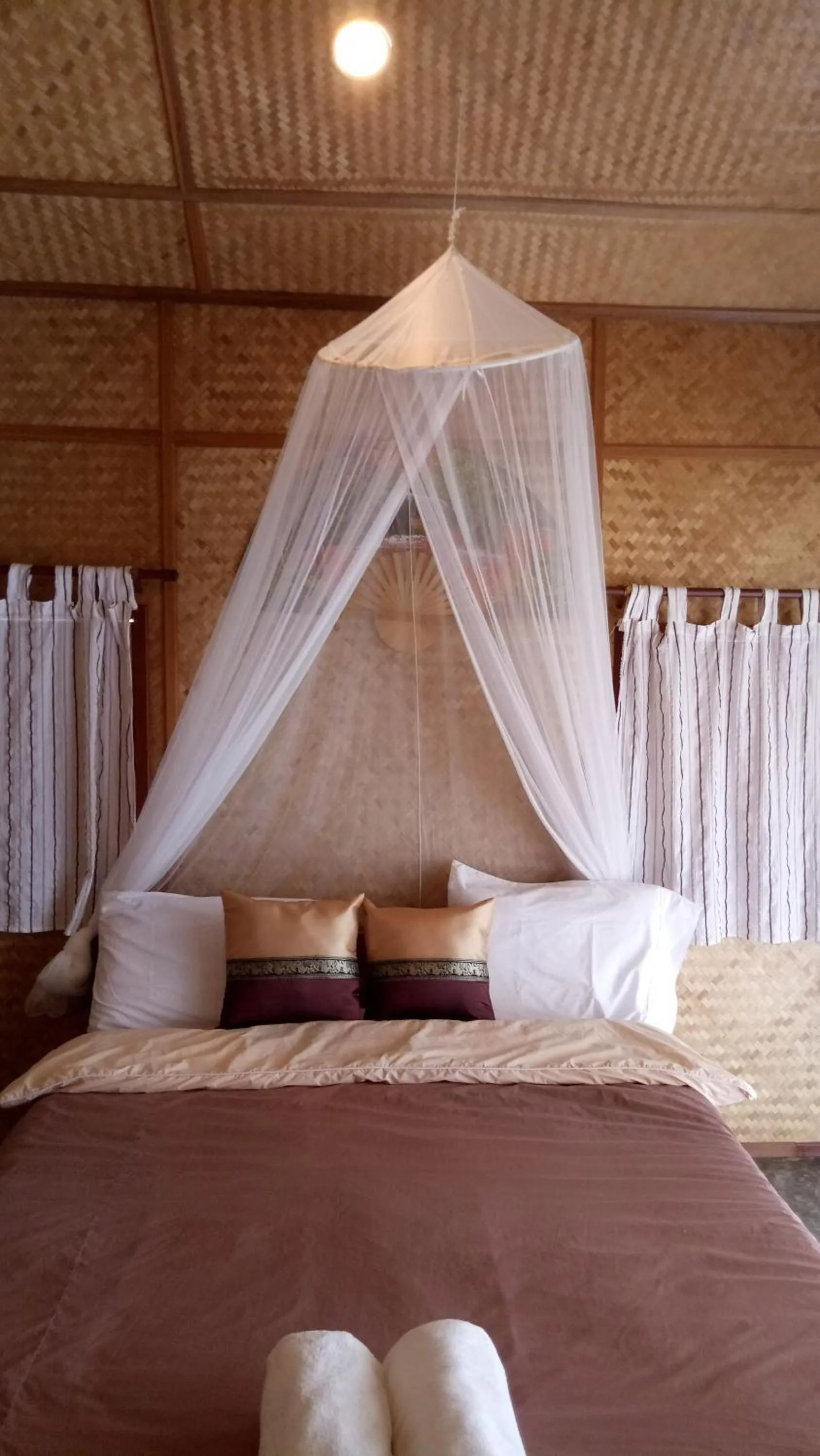 Bed in Tulip Resort Pai