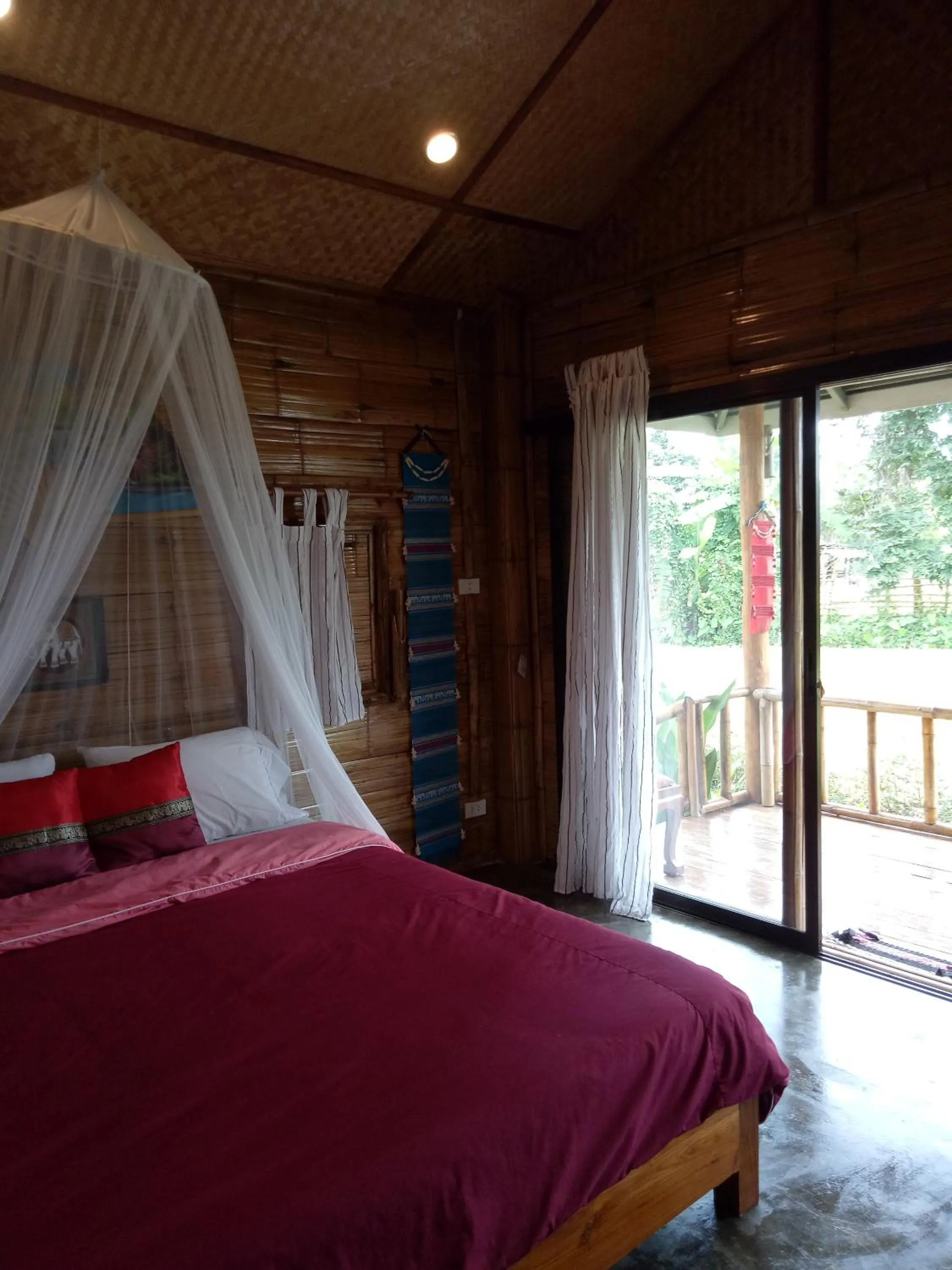 Bed in Tulip Resort Pai