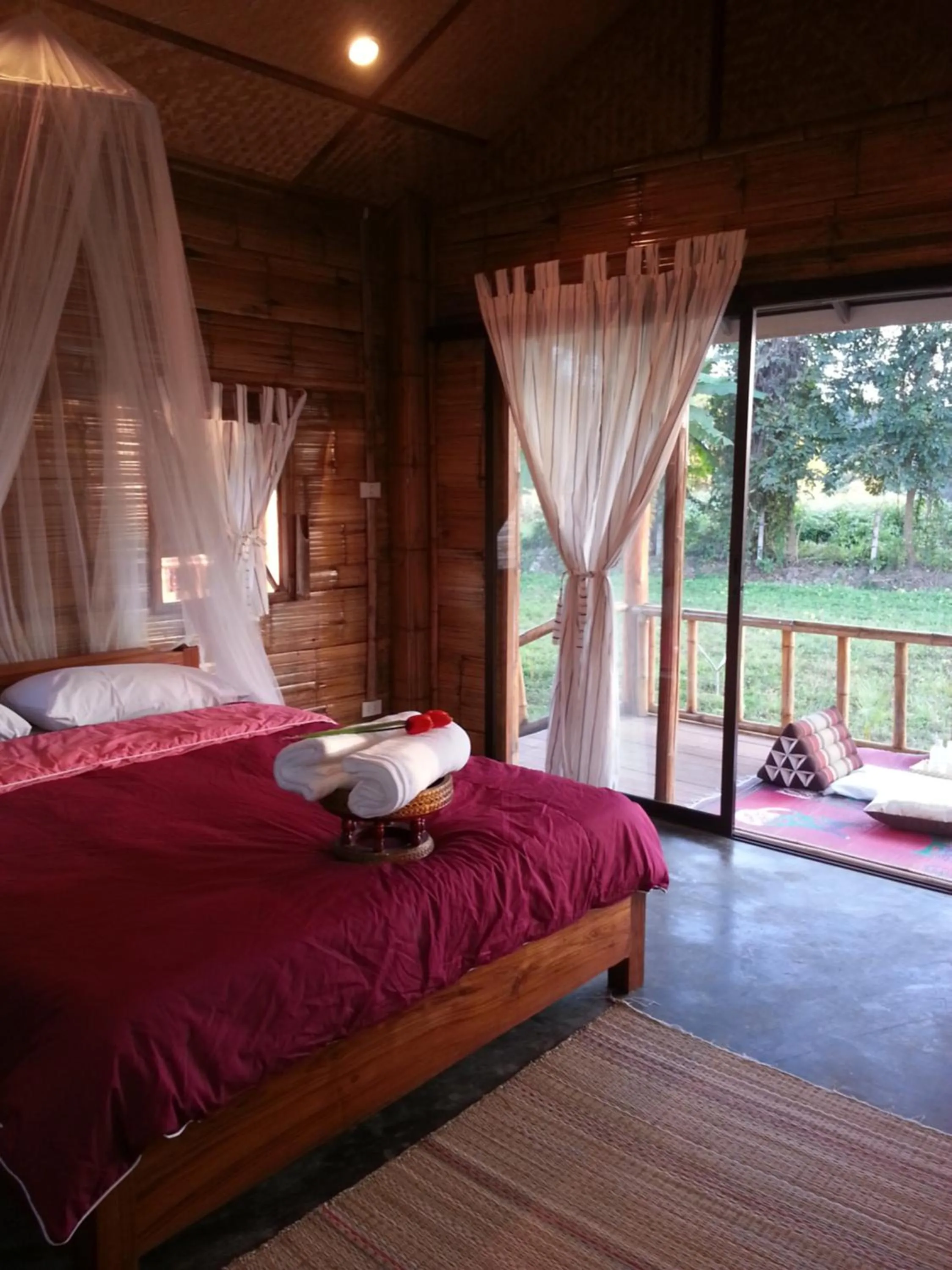 Bed in Tulip Resort Pai