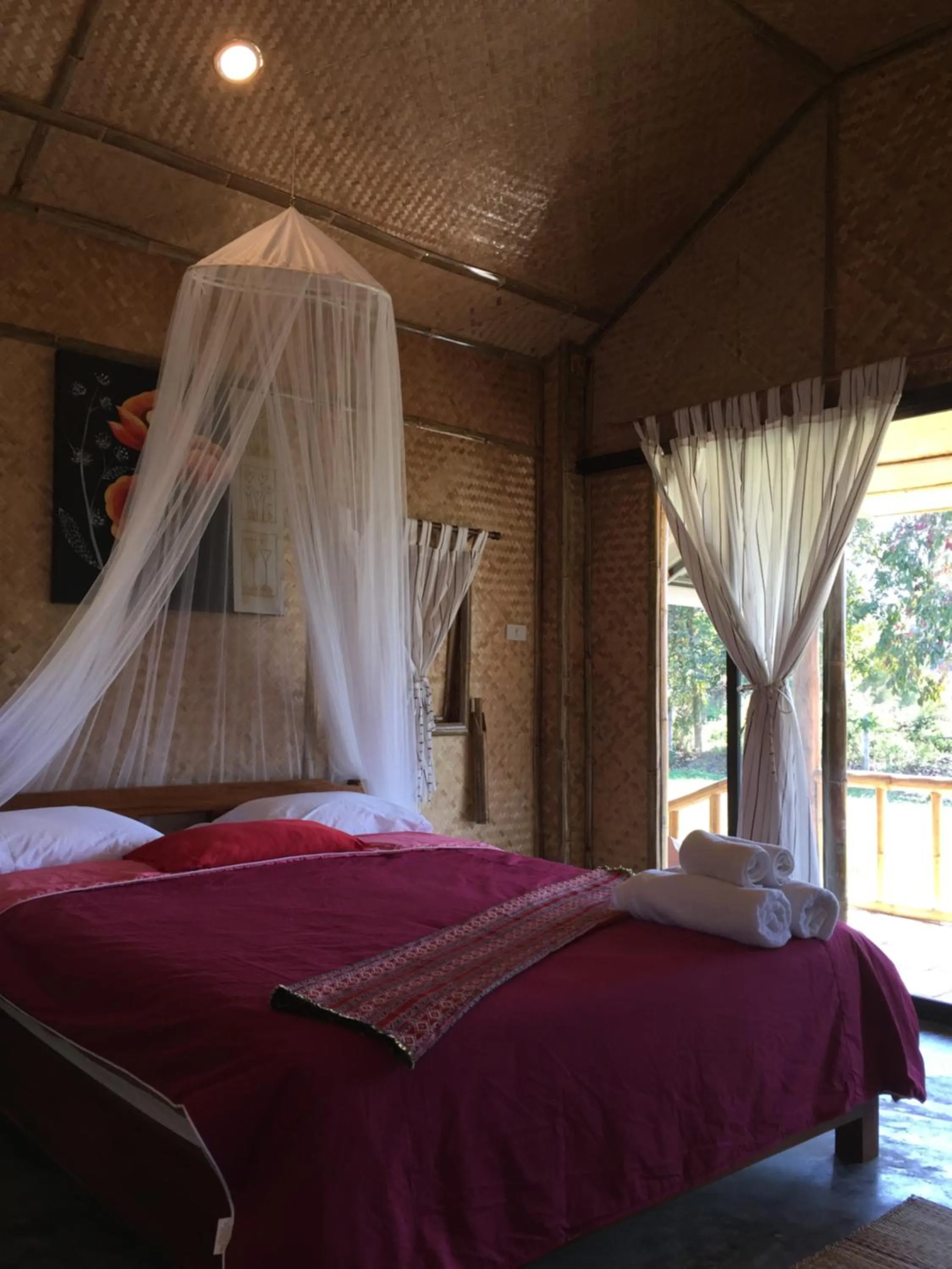 Bed in Tulip Resort Pai