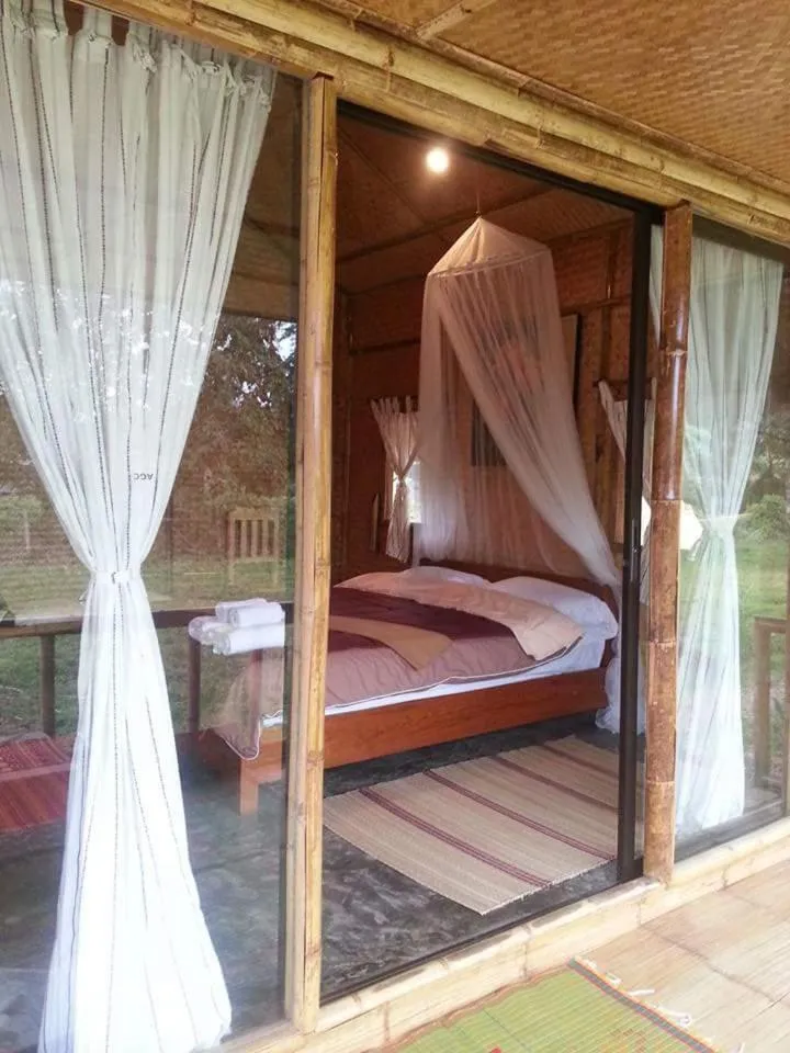 Bed in Tulip Resort Pai
