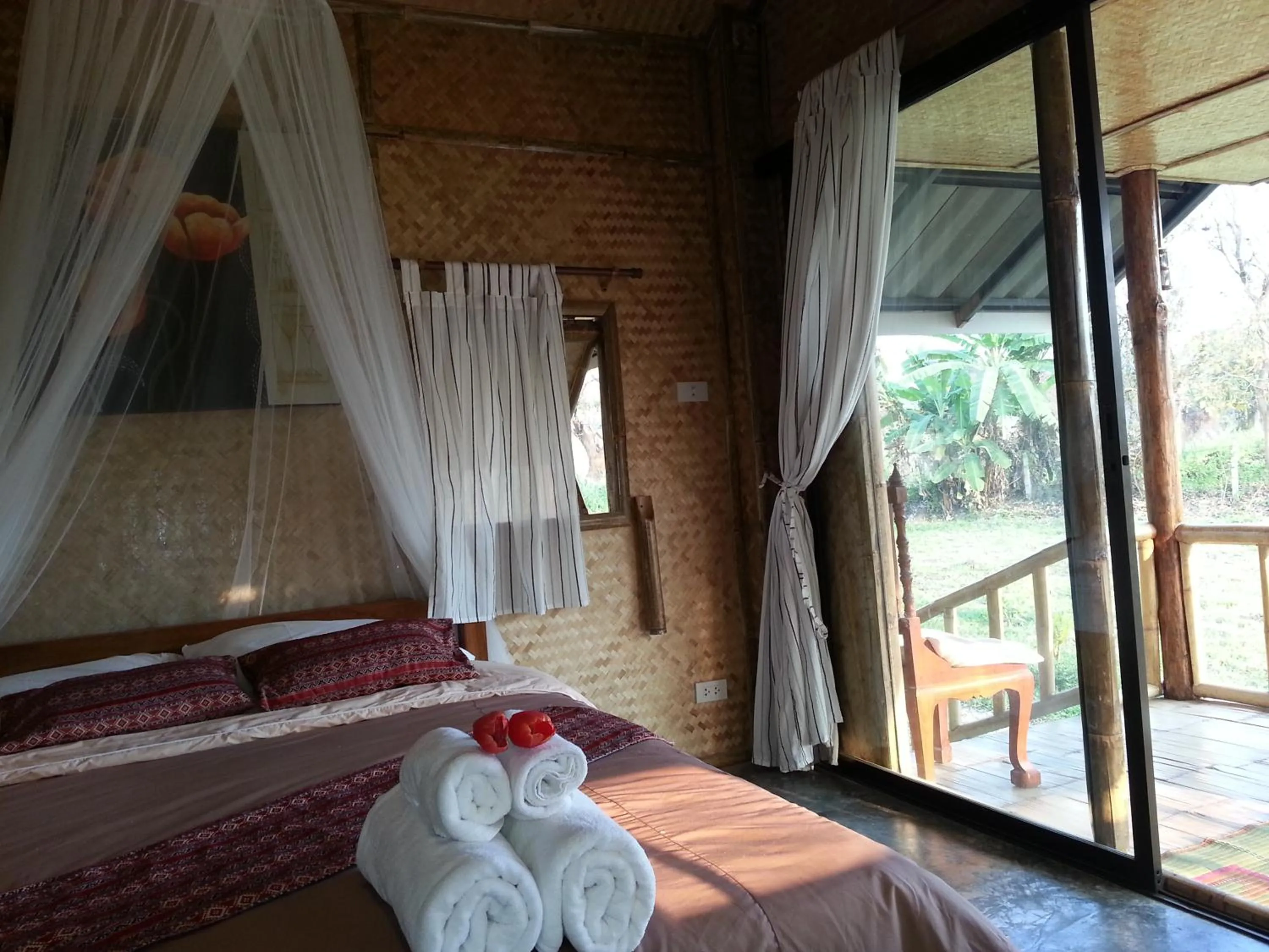 Bed in Tulip Resort Pai