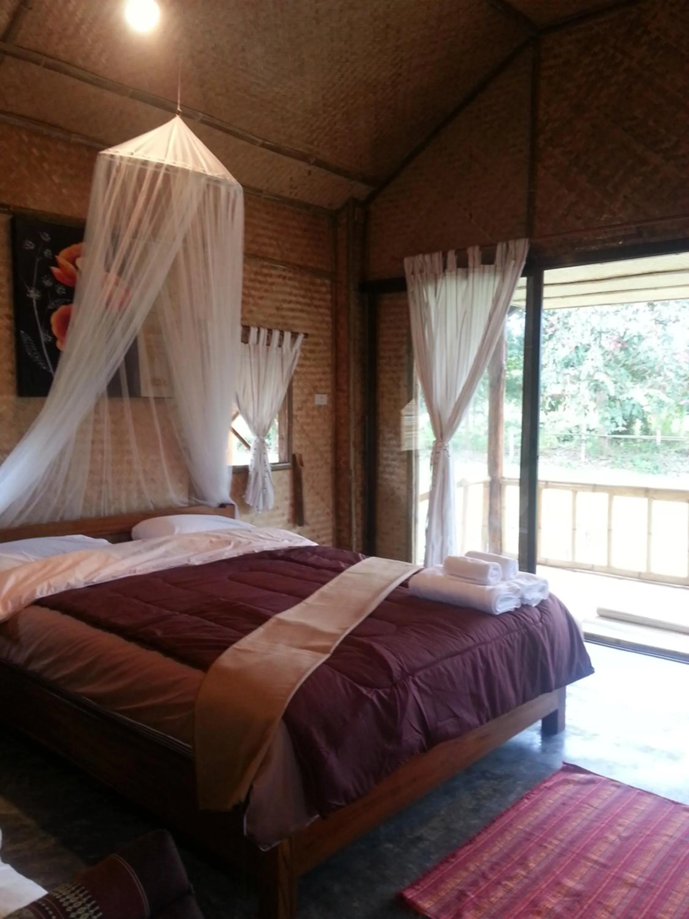 Bed in Tulip Resort Pai