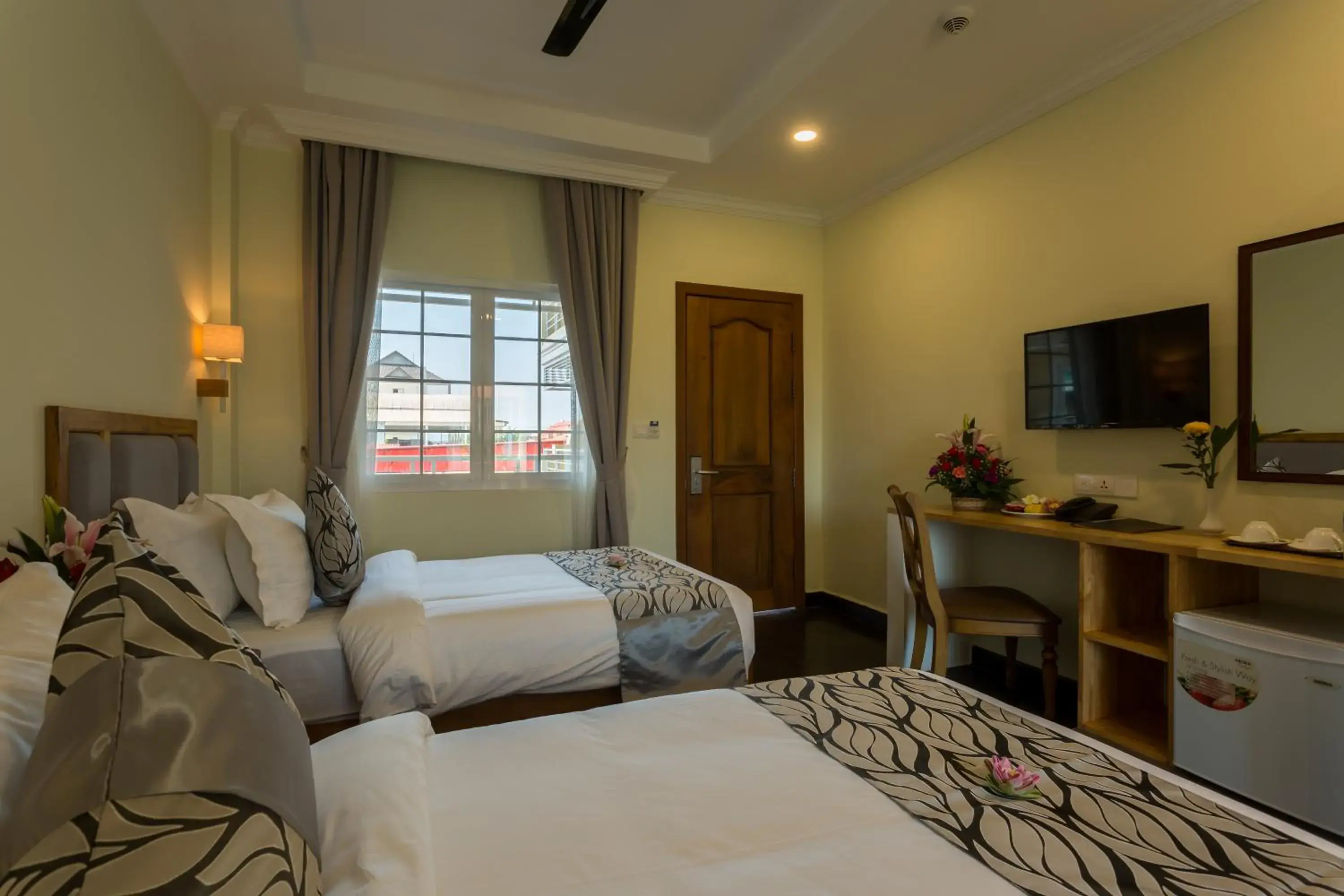Photo of the whole room, Bed in Grand Bayon Siem Reap Hotel