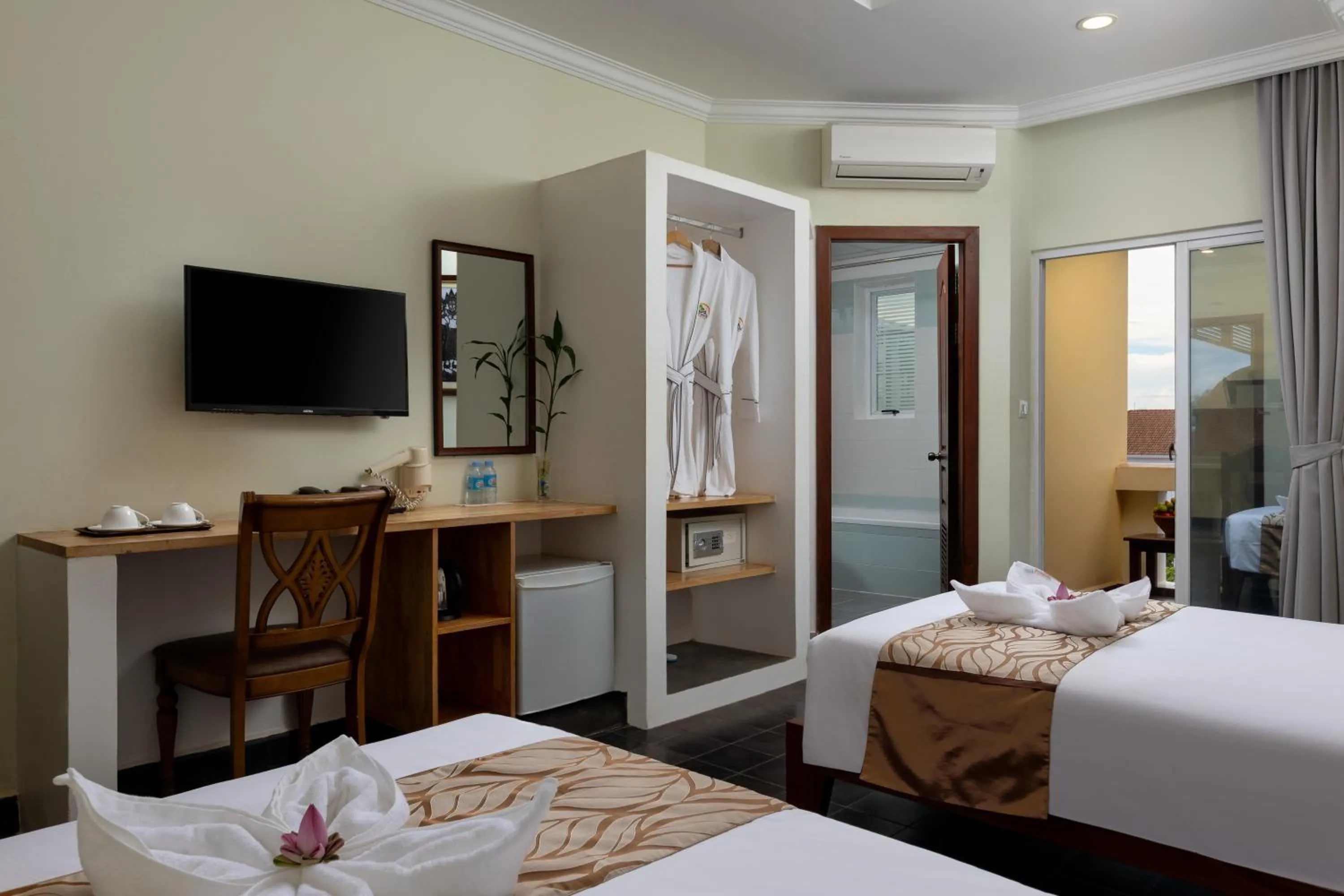 Bed in Grand Bayon Siem Reap Hotel