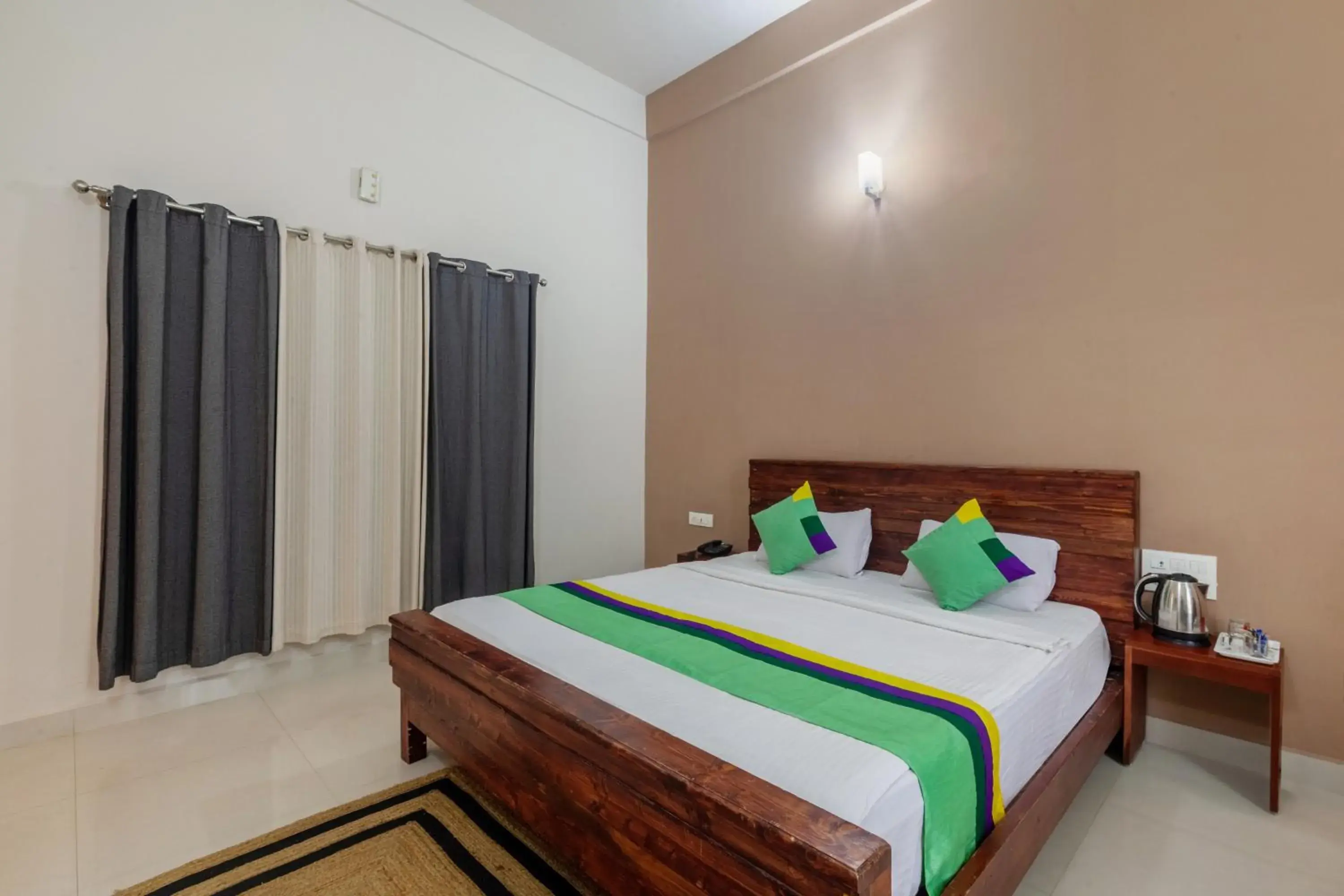 Bedroom, Bed in Treebo Vrindavan, 3 Km From Madikeri Fort Bedroom, Bed in Treebo Vrindavan, 3 Km From Madikeri Fort