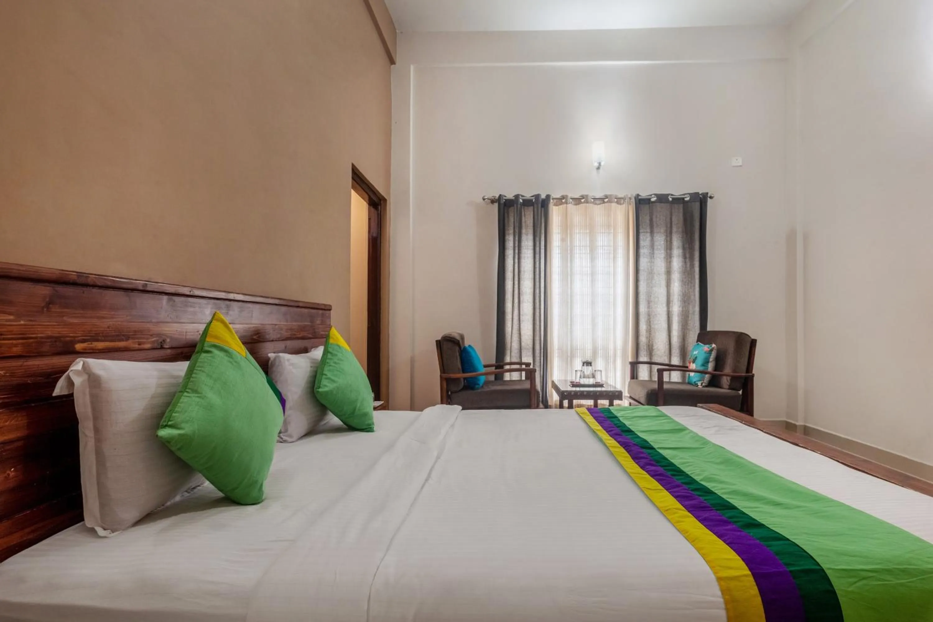 Bedroom, Bed in Treebo Vrindavan, 3 Km From Madikeri Fort