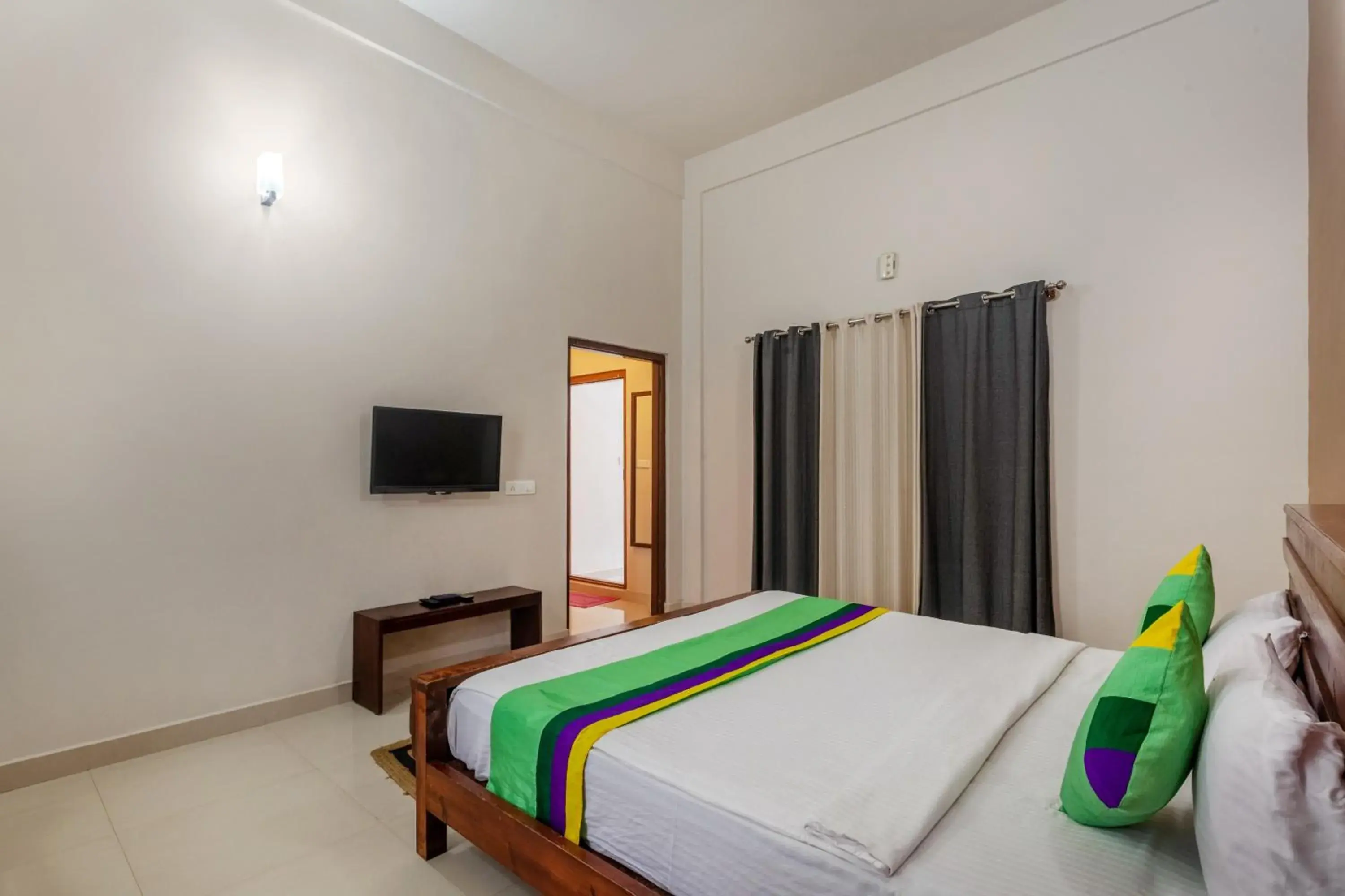 Bedroom, Bed in Treebo Vrindavan, 3 Km From Madikeri Fort Bedroom, Bed in Treebo Vrindavan, 3 Km From Madikeri Fort