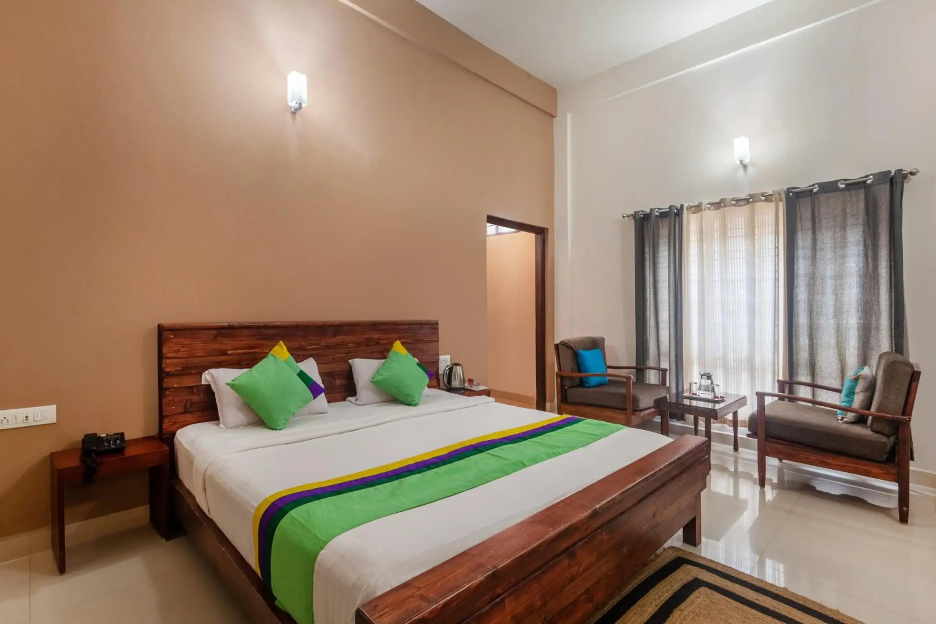 Bedroom, Bed in Treebo Vrindavan, 3 Km From Madikeri Fort Bedroom, Bed in Treebo Vrindavan, 3 Km From Madikeri Fort