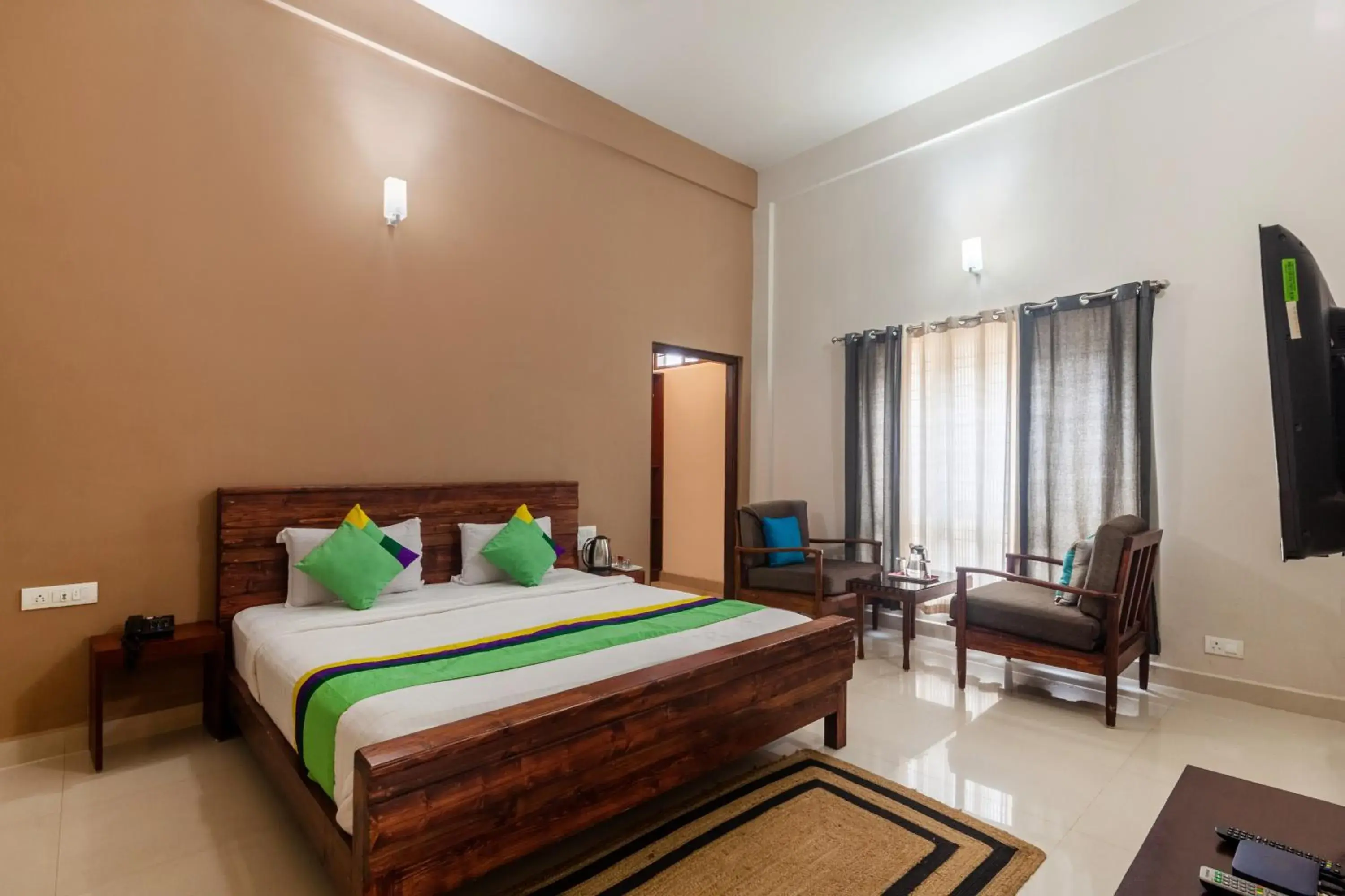 Bedroom, Bed in Treebo Vrindavan, 3 Km From Madikeri Fort Bedroom, Bed in Treebo Vrindavan, 3 Km From Madikeri Fort