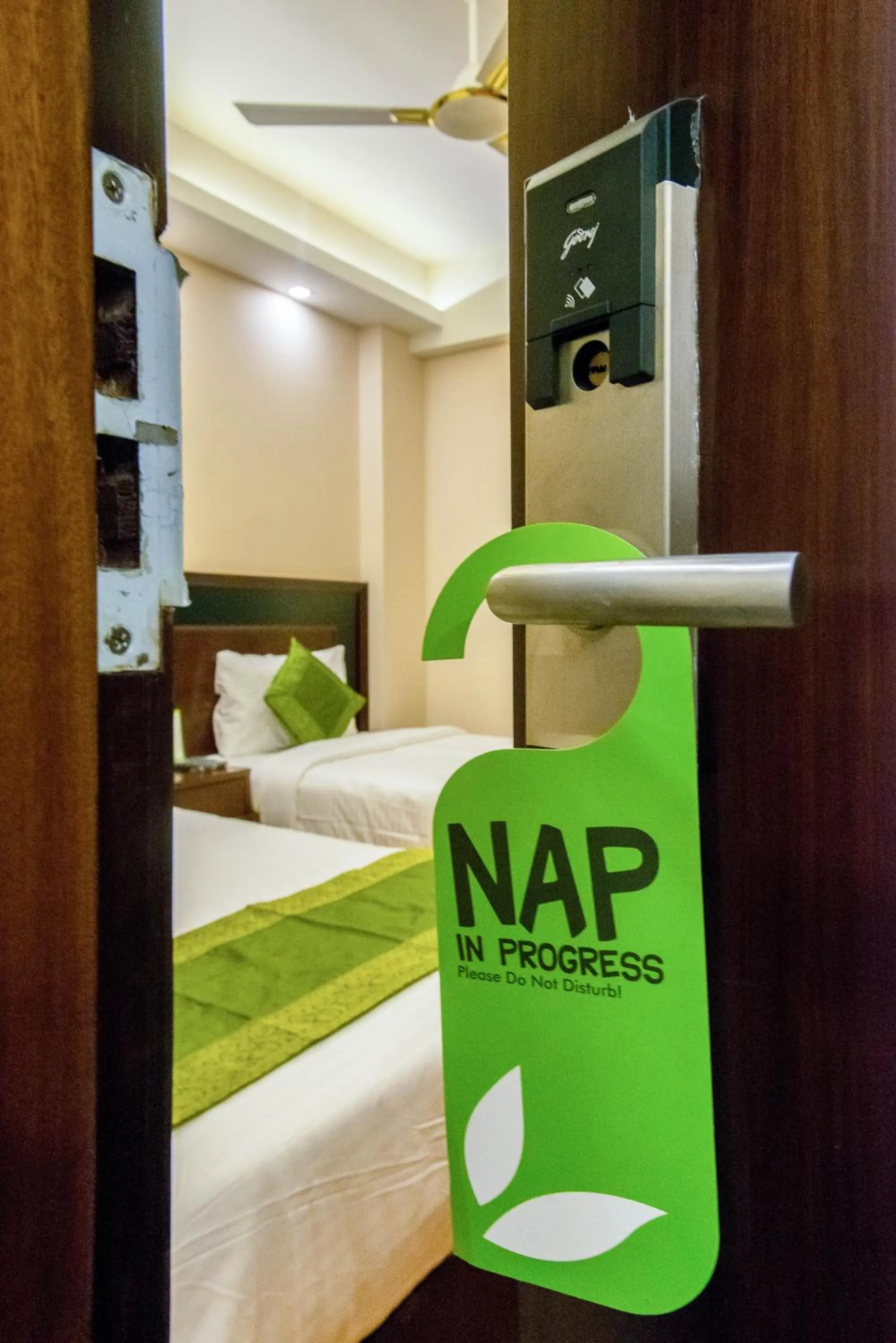 Bed in Treebo Vedanta, Metropolitan