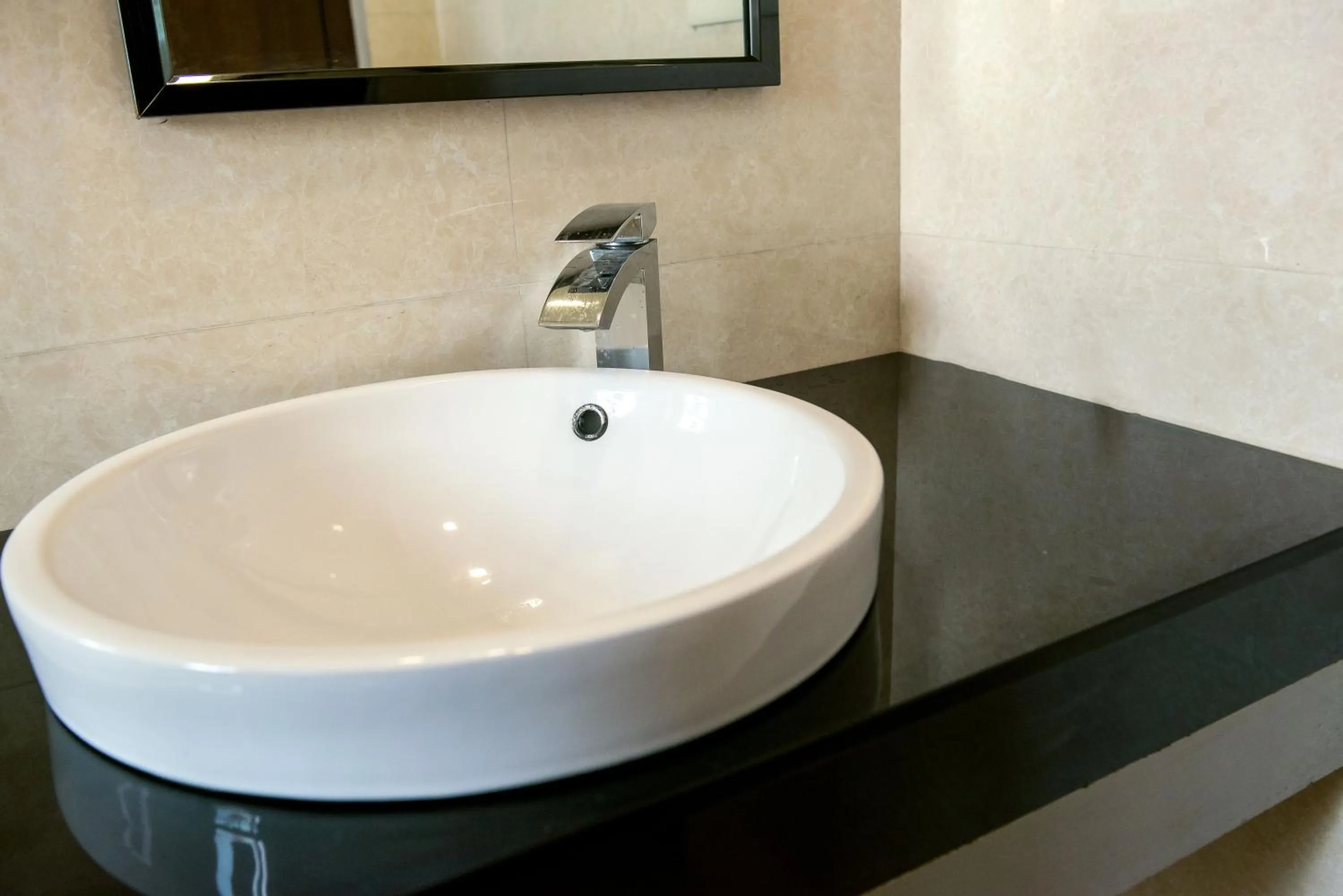 Bathroom in Treebo Vedanta, Metropolitan