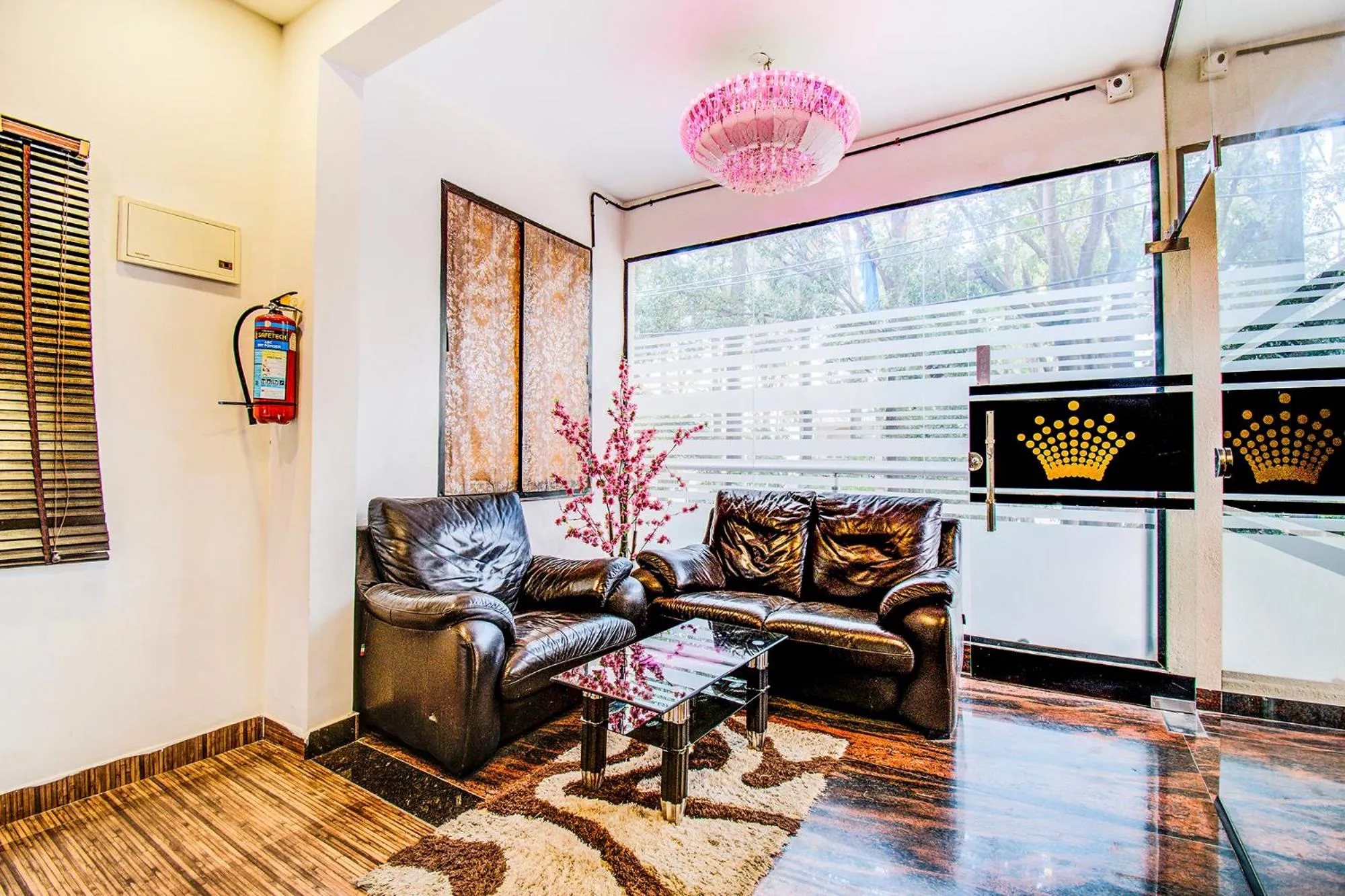 Seating area in FabHotel Corporate Crown - Nr Jyoti Nivas University