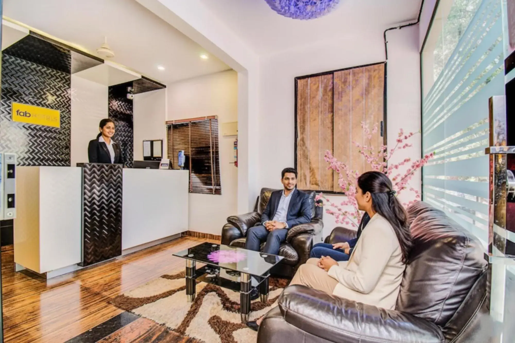 Lobby or reception in FabHotel Corporate Crown - Nr Jyoti Nivas University Lobby or reception in FabHotel Corporate Crown - Nr Jyoti Nivas University