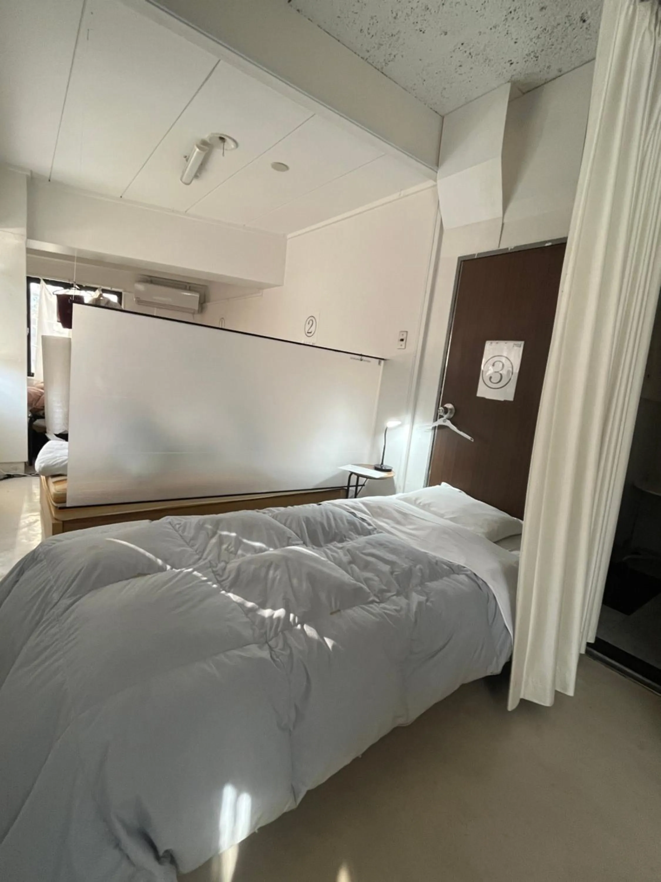 Bed in Guest House M104 Kagoshima