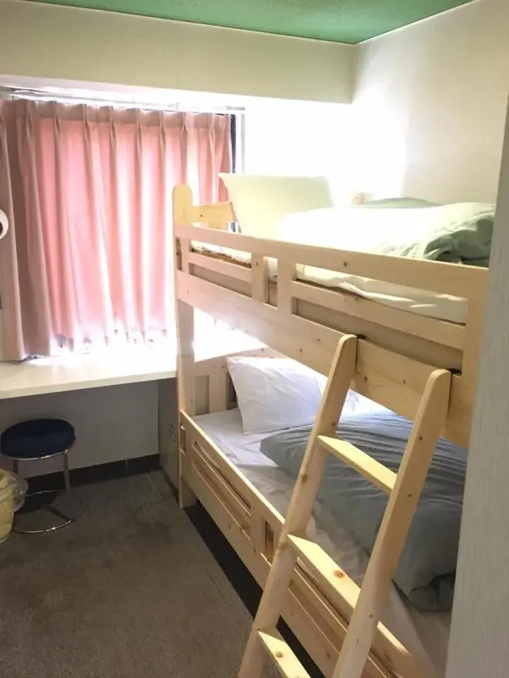 Bed in Guest House M104 Kagoshima Bed in Guest House M104 Kagoshima