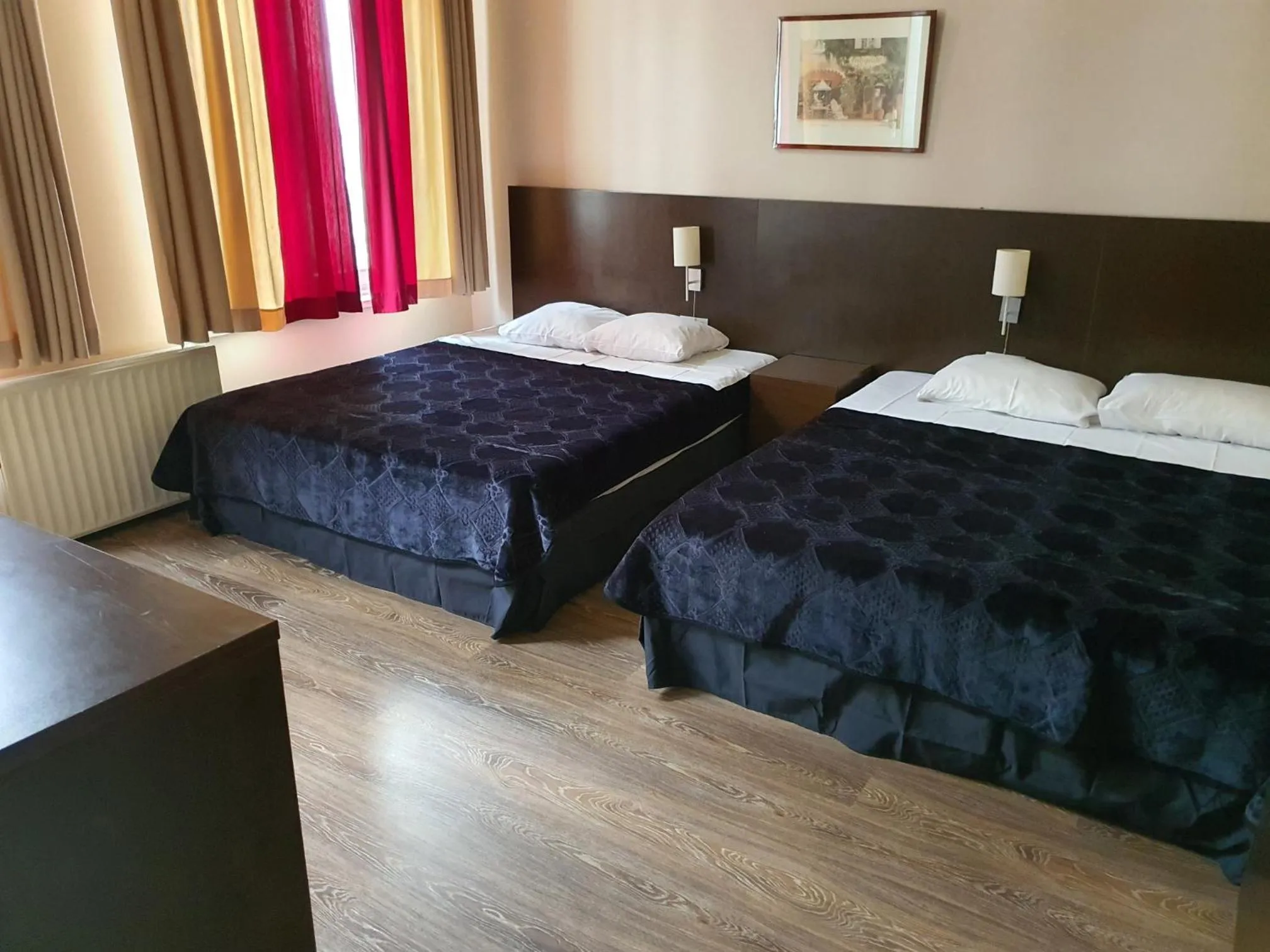 Bed in Hotel Queen Mary