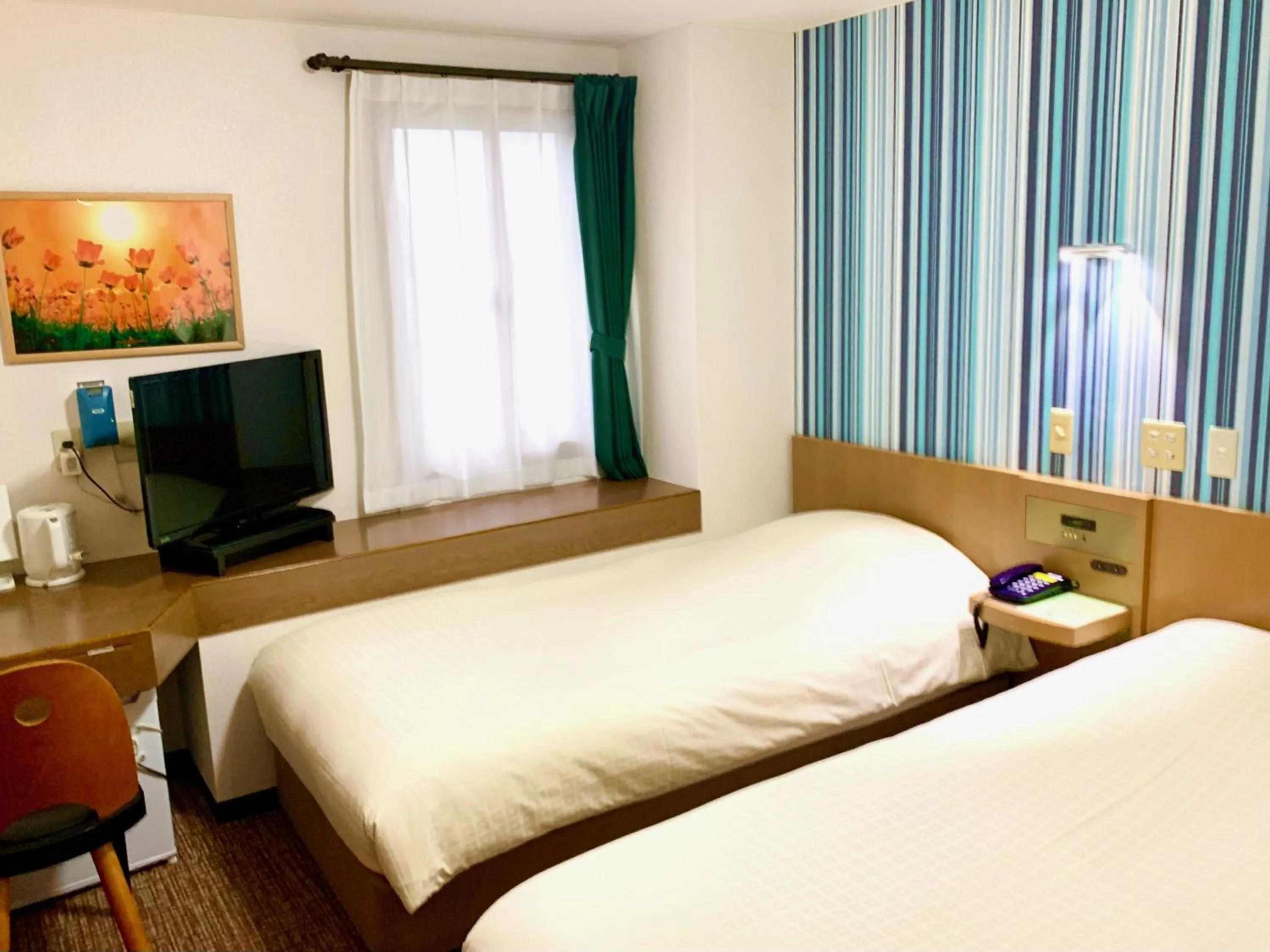 Bed in Business Hotel Raicho