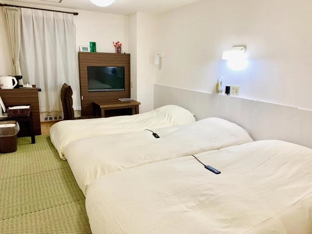 Bed in Business Hotel Raicho