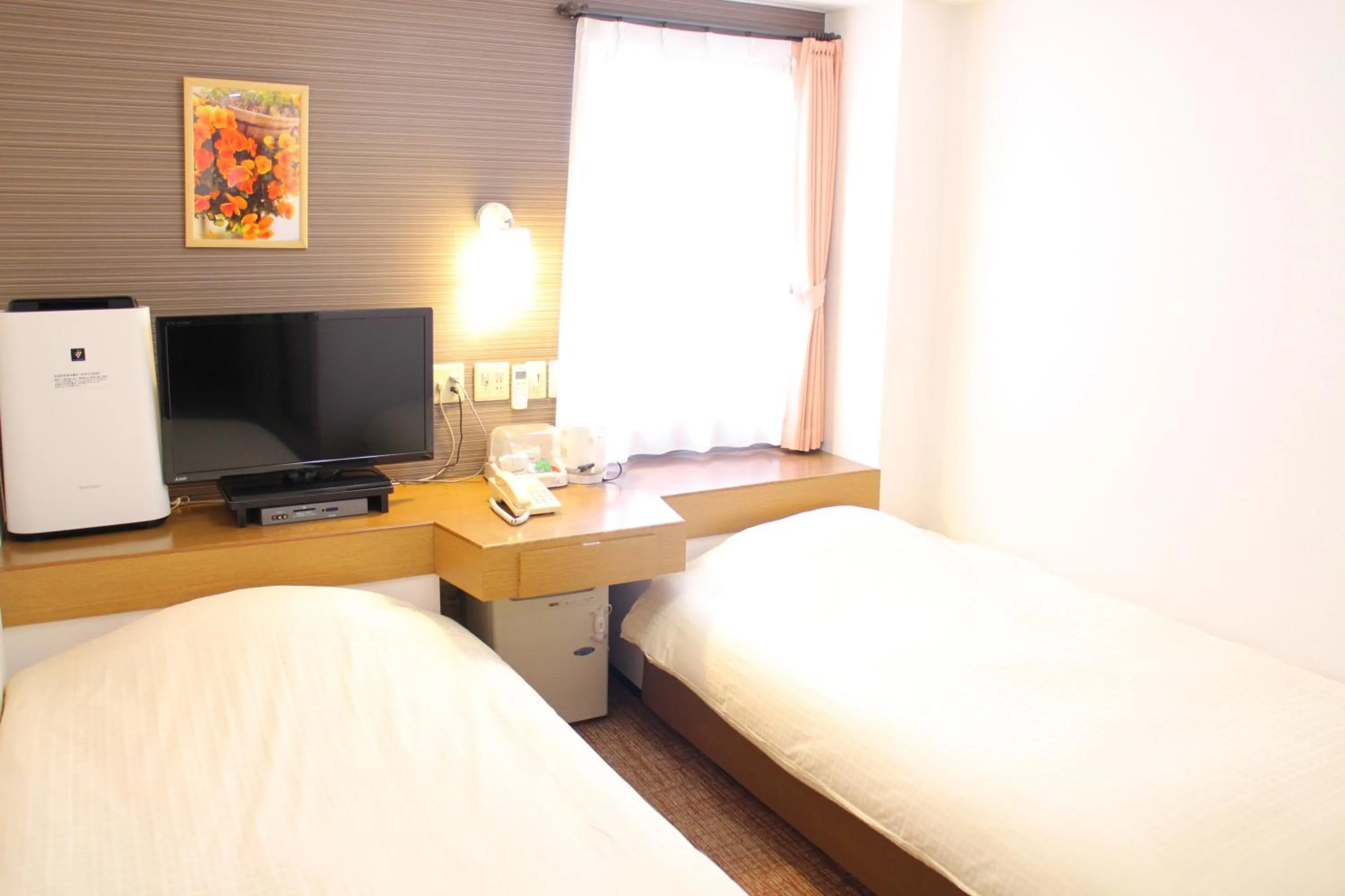 Photo of the whole room, Bed in Business Hotel Raicho