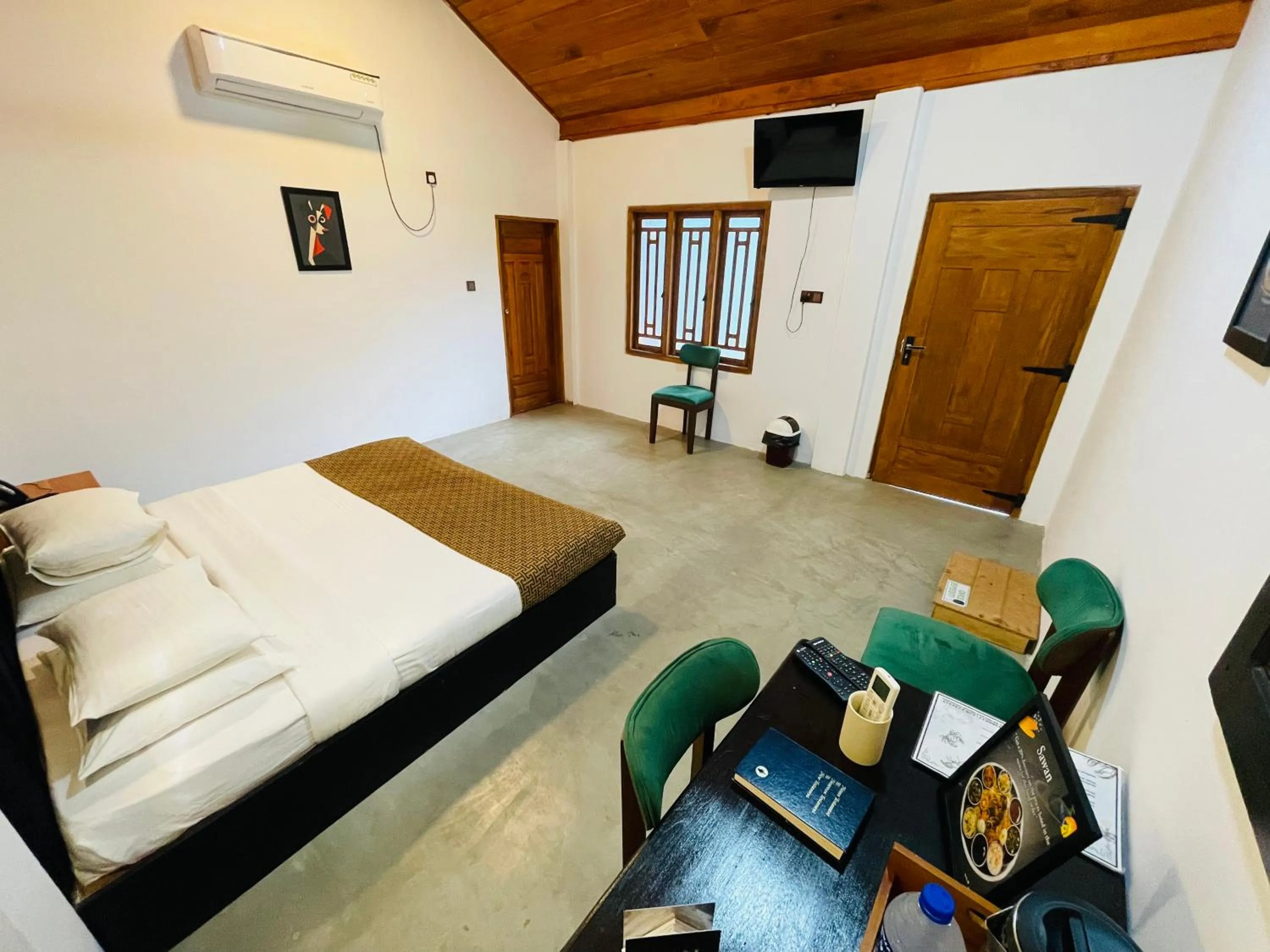 Bed in Nilaveli Hybrid Holiday Hotel