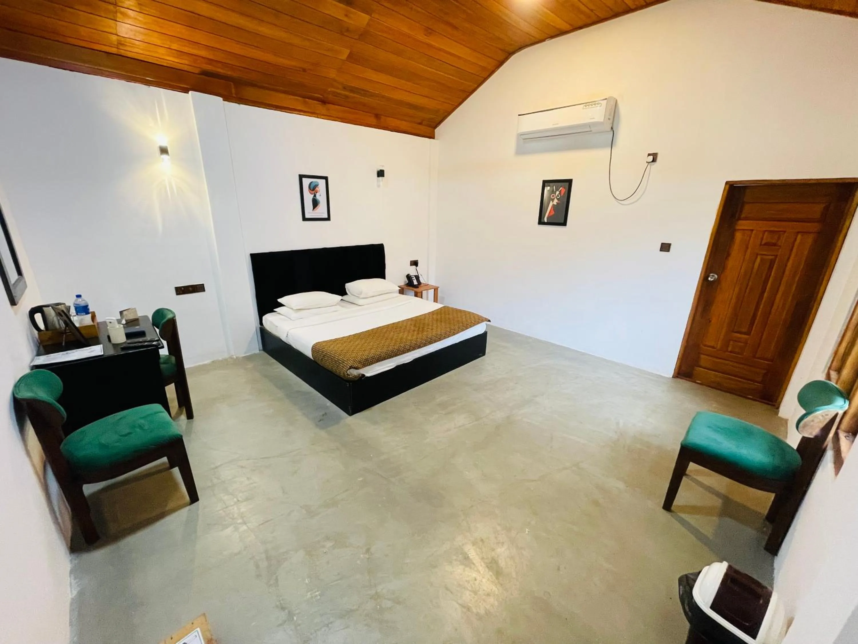 Bed in Nilaveli Hybrid Holiday Hotel