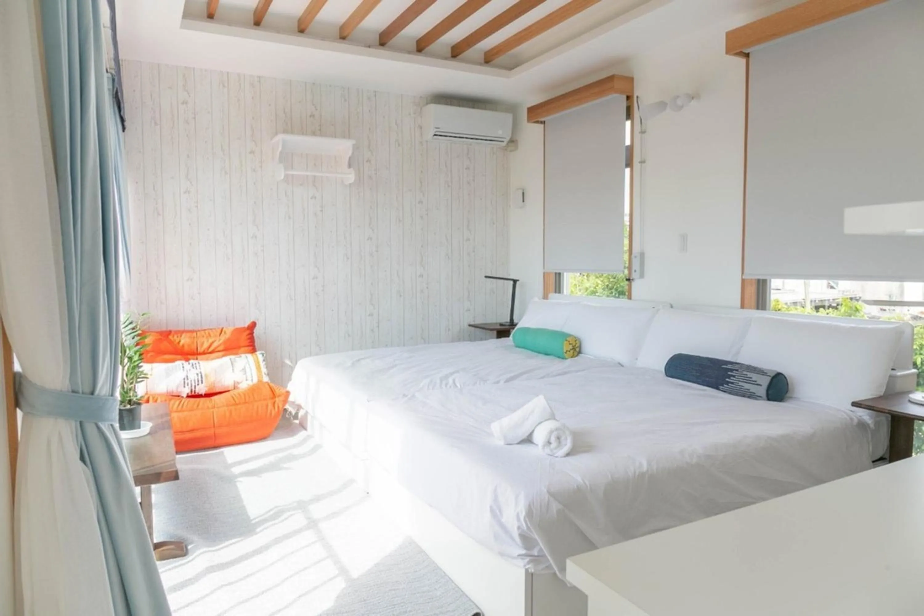 Bed in La Casa Panacea Okinawa Resort